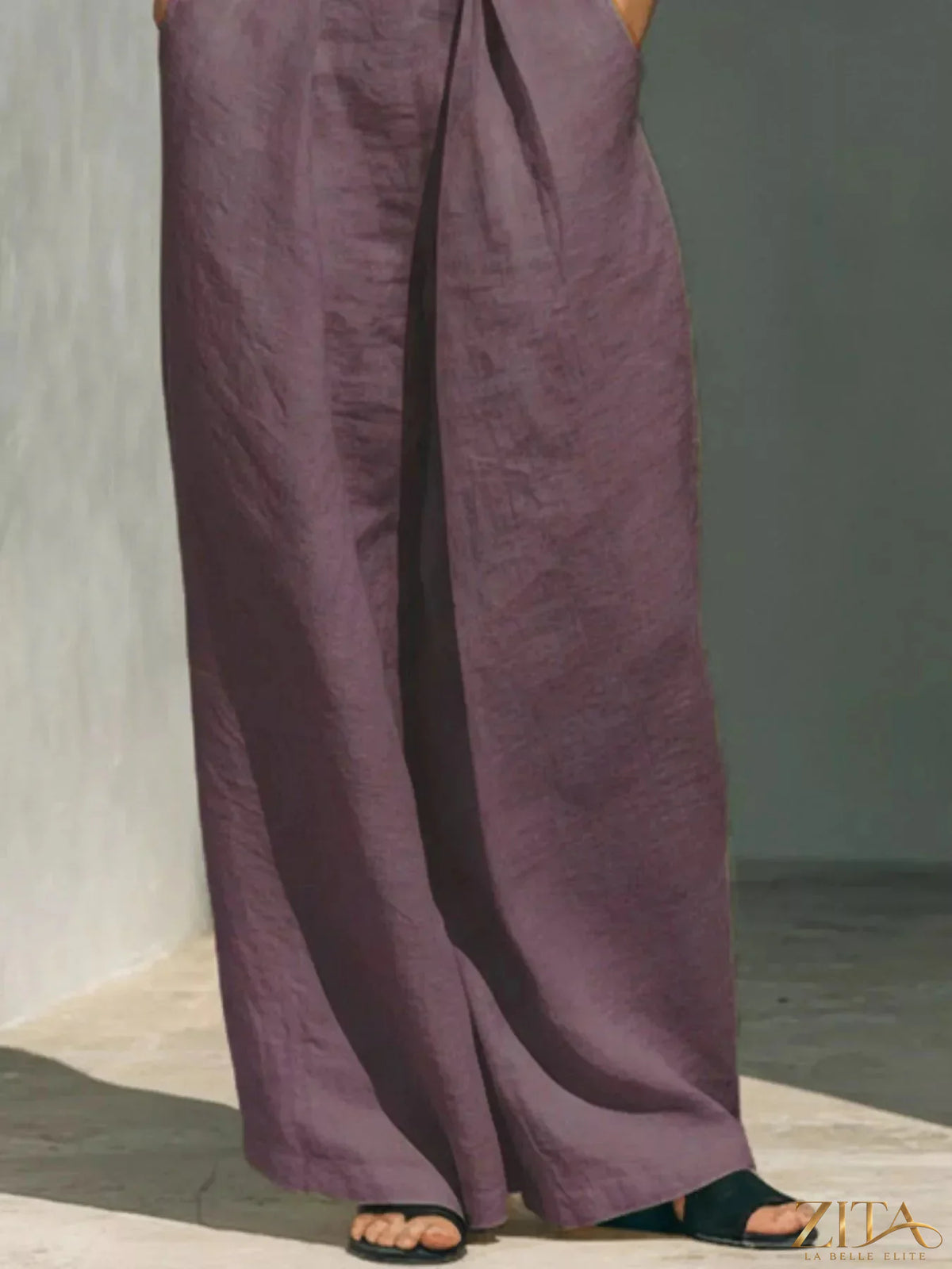 Plus size Zita La Belle Elite sleeveless turtleneck top and wide-leg pants set, shown together in a stylish outfit.
