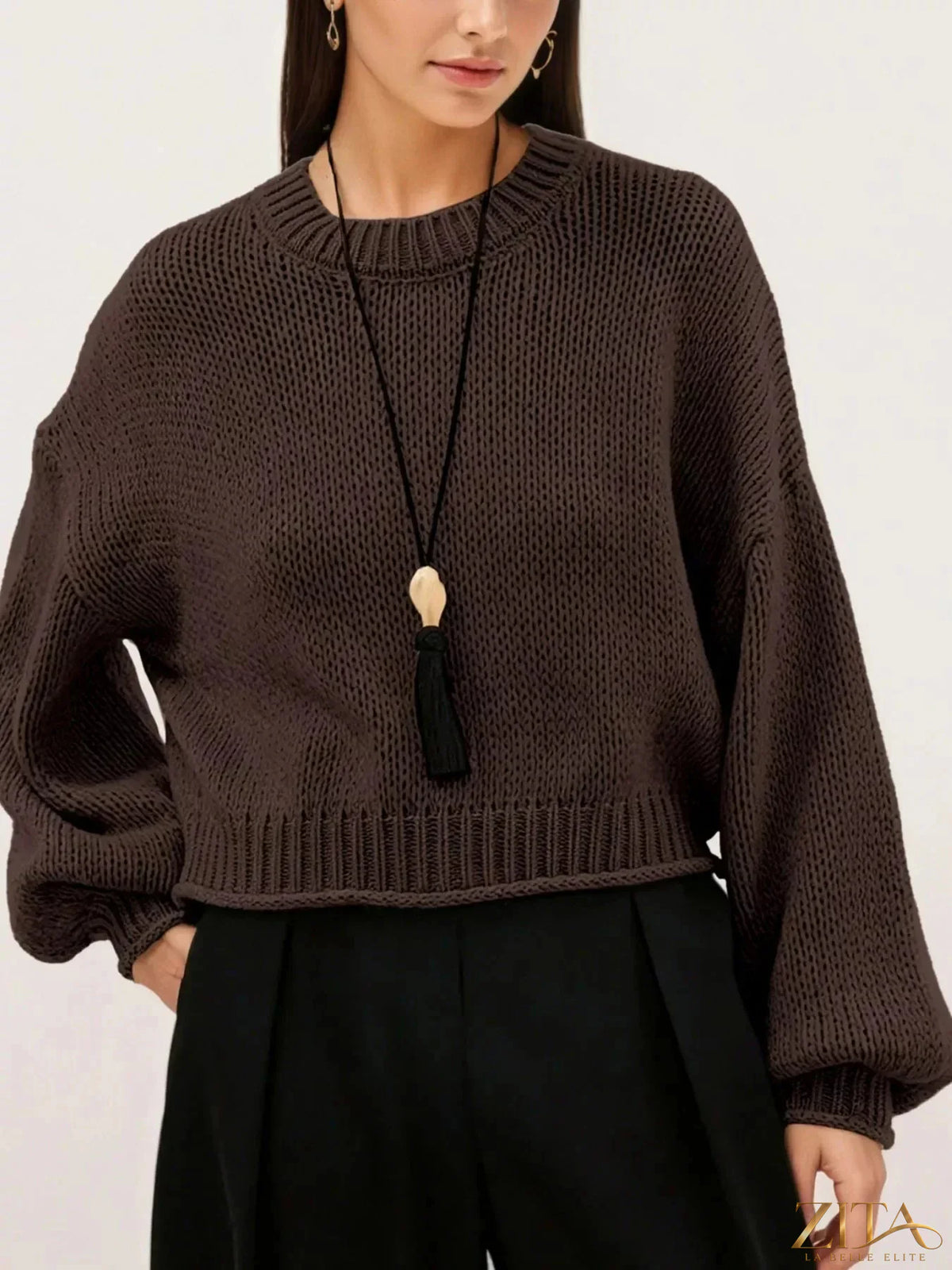 Trendsi oversized chunky knit sweater in neutral tones, featuring a cozy, relaxed fit with textured knit fabric.