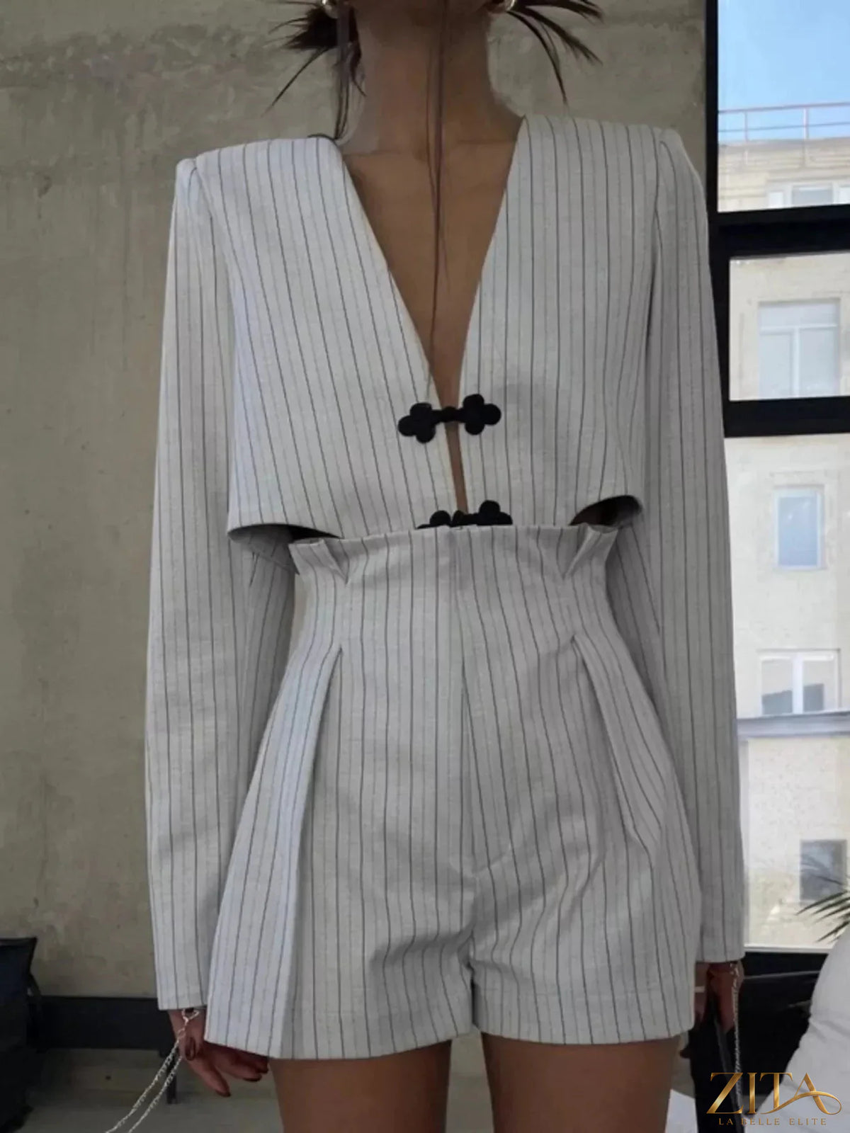 Zita La Belle Elite pinstripe cropped blazer and pleated shorts set, stylish women's fashion ensemble with tailored blazer and matching shorts.