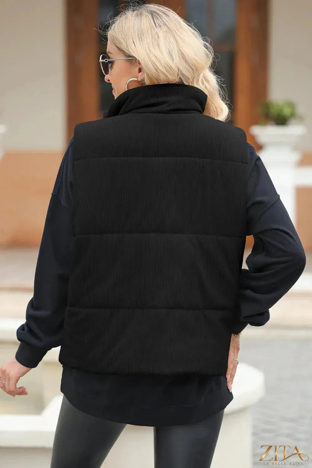 Trendsi pocketed zip-up turtleneck vest coat in black, featuring a high collar and front pockets, casual and stylish outerwear.