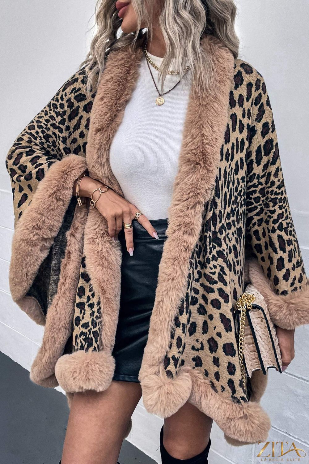 Leopard open front poncho by Trendsi featuring a stylish animal print and relaxed fit, perfect for layering in cooler weather.