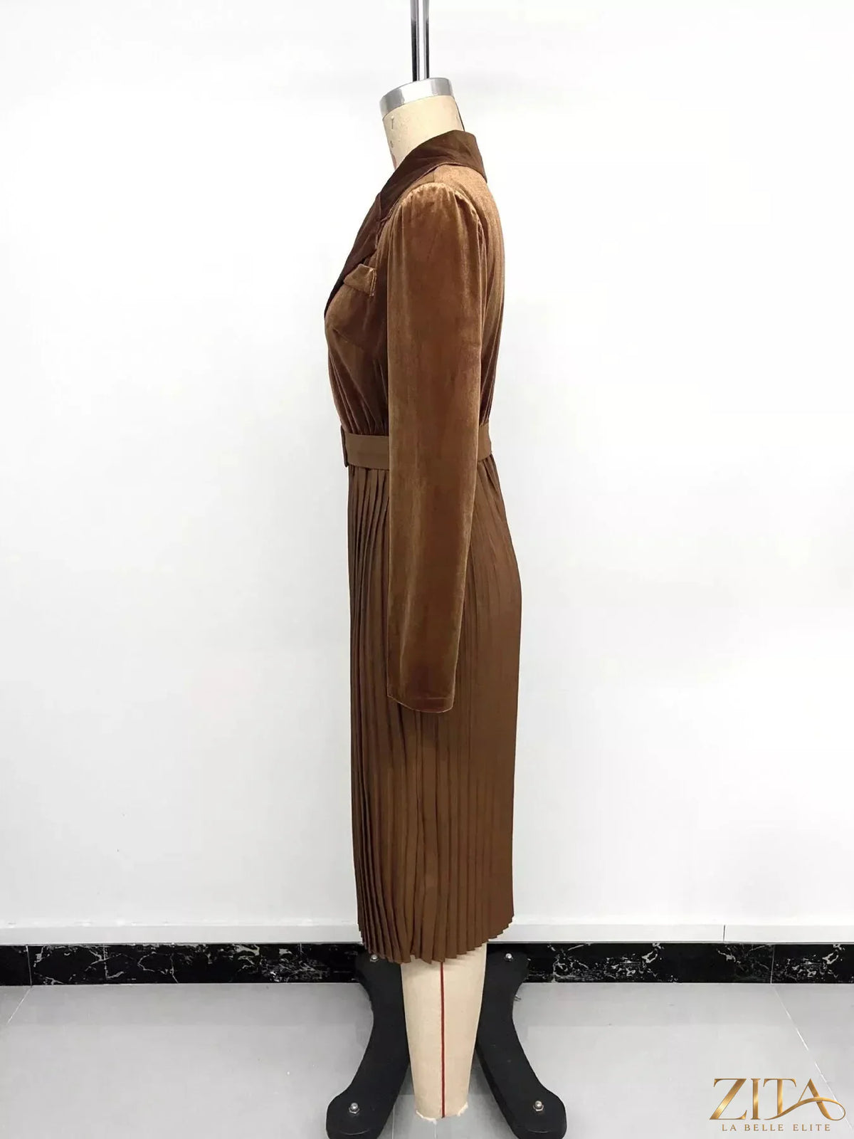 Velvet pleated midi blazer dress by Zita La Belle Elite, showing a stylish, fitted dress with pleats and a blazer-inspired design.