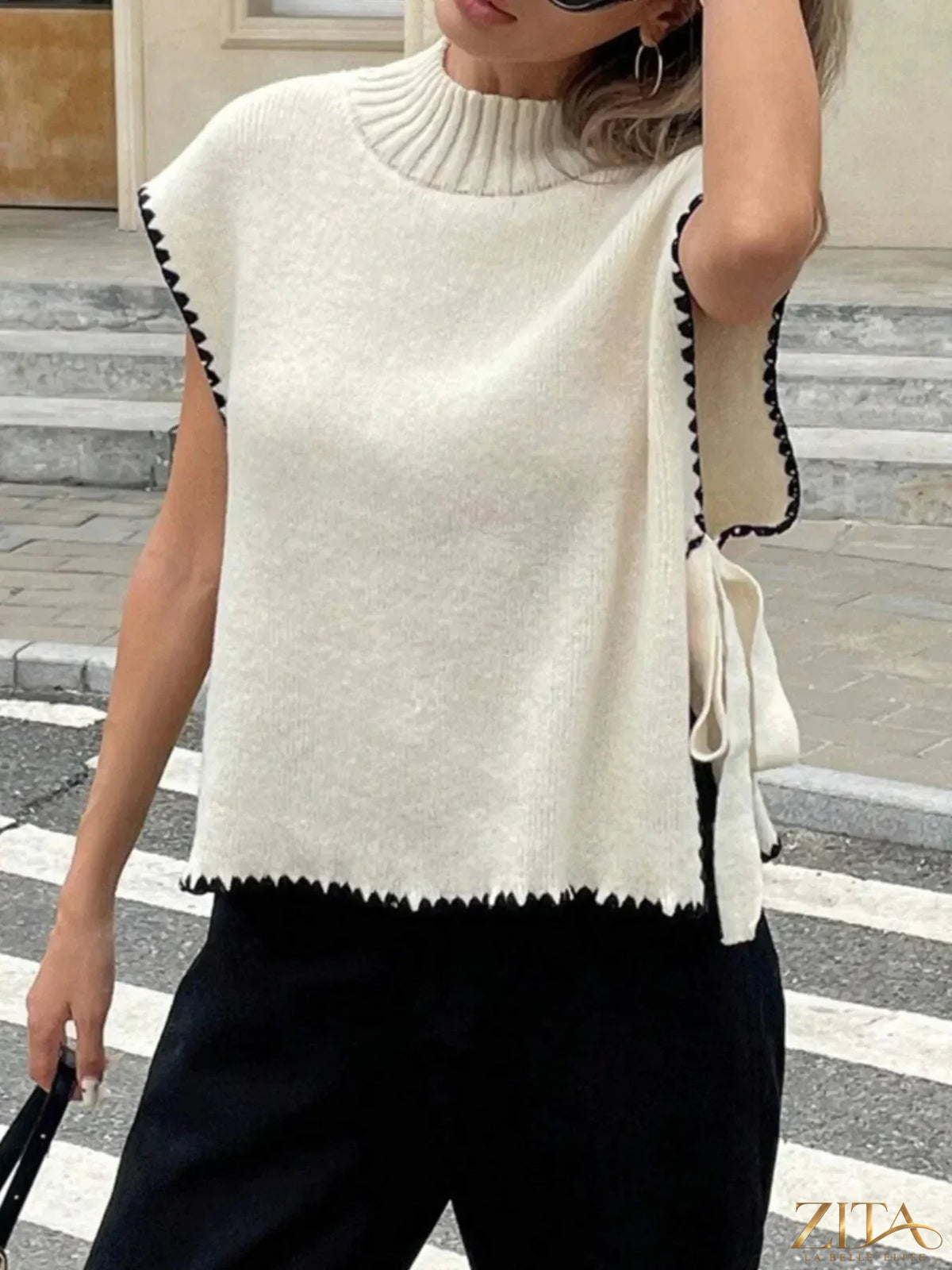 Ribbed turtleneck sweater vest with contrast trim, Trendsi, showcasing its textured knit and stylish design.