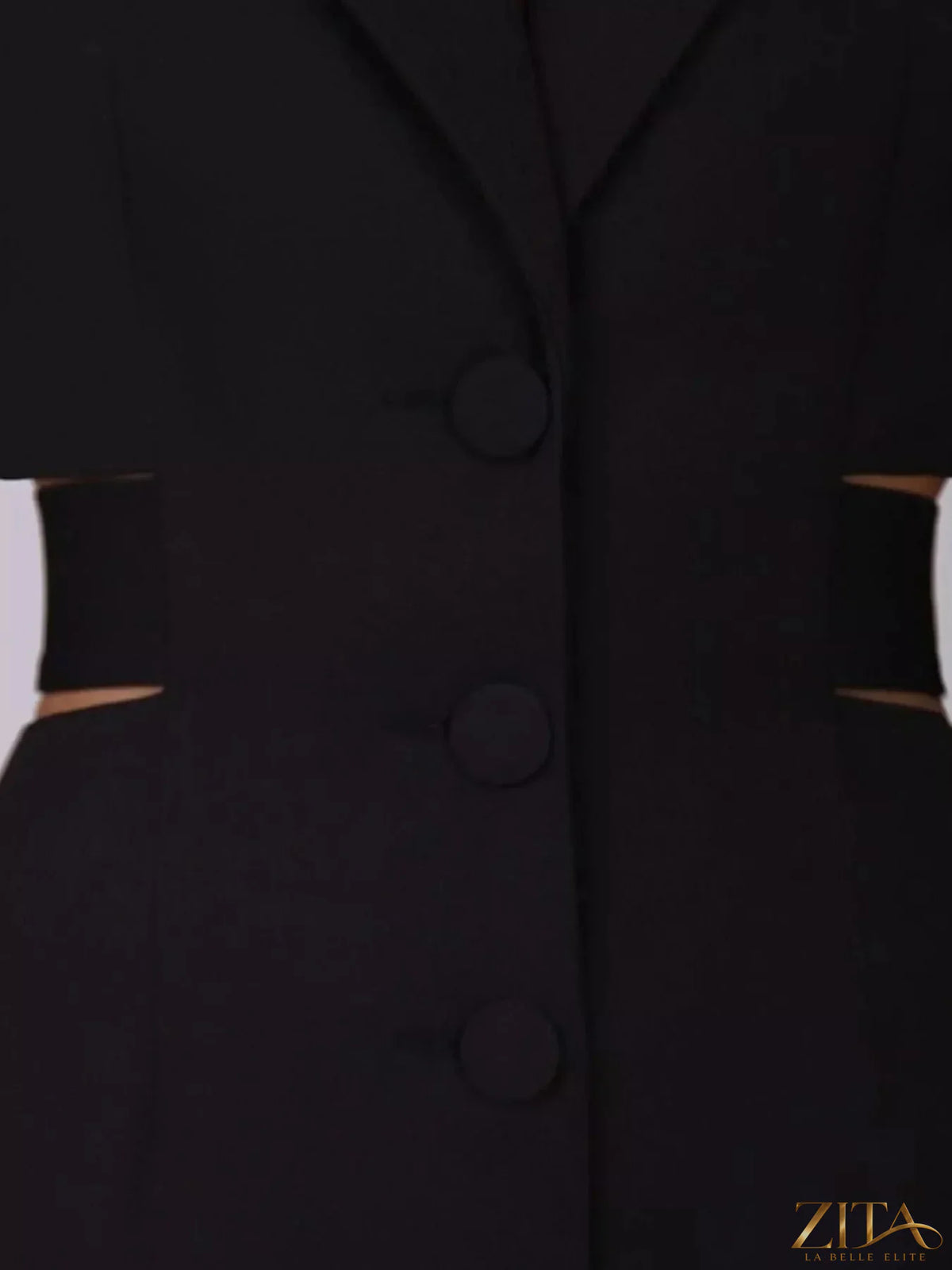 Zita La Belle Elite button-down blazer dress with a cut-out waist, tailored fit, and classic lapel collar shown in the image.