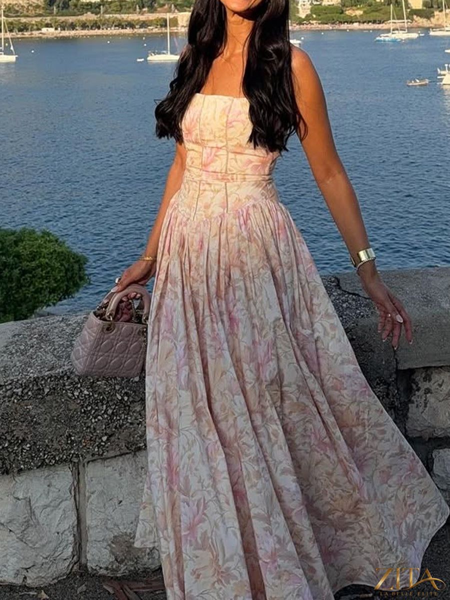 Printed strapless backless maxi dress by Zita La Belle Elite, fitted long dress with vibrant pattern and flowing silhouette.