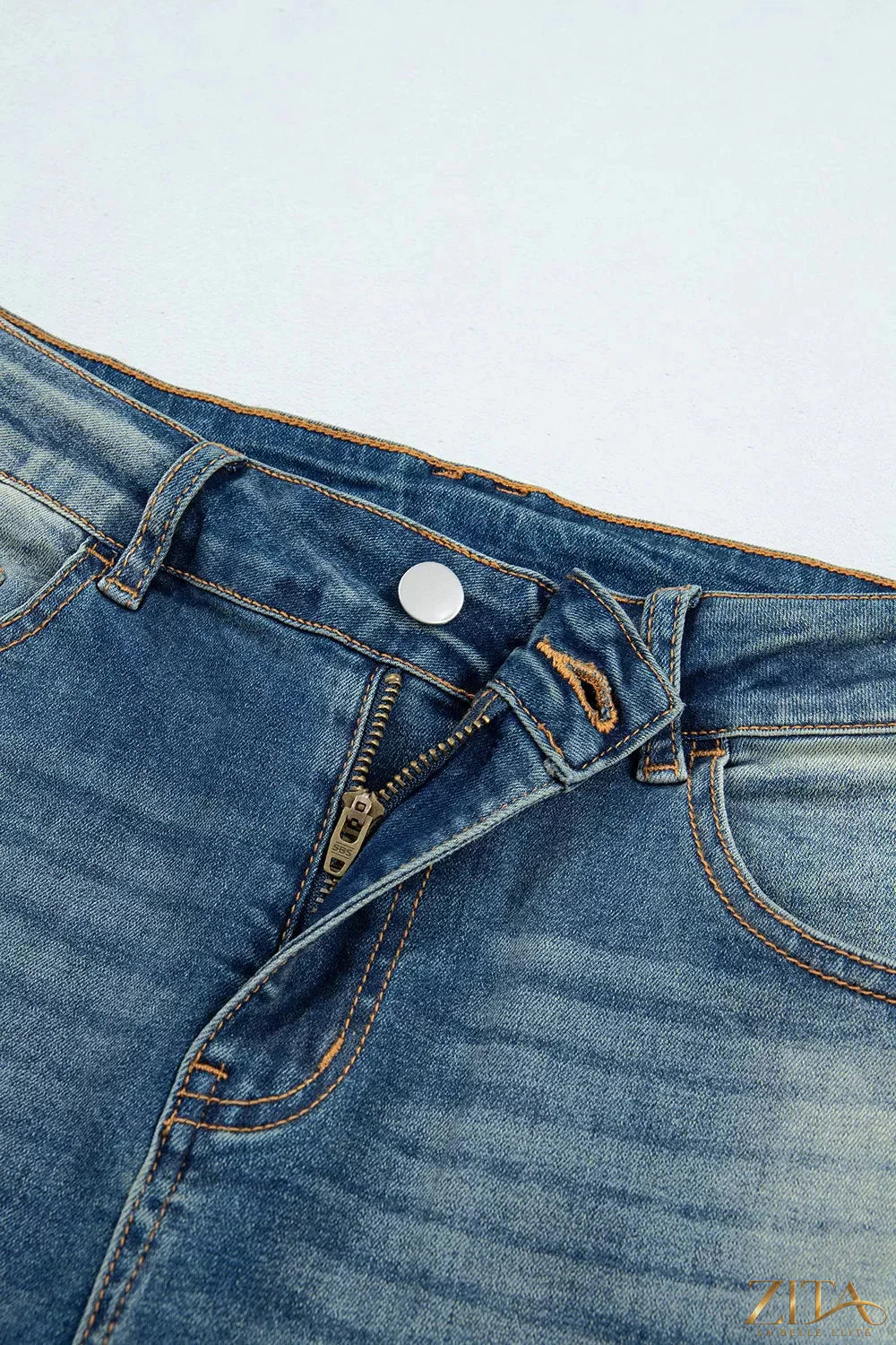 Zita La Belle Elite pocket detail flare leg jeans with high-rise fit and light wash denim, stylish and trendy for casual wear.