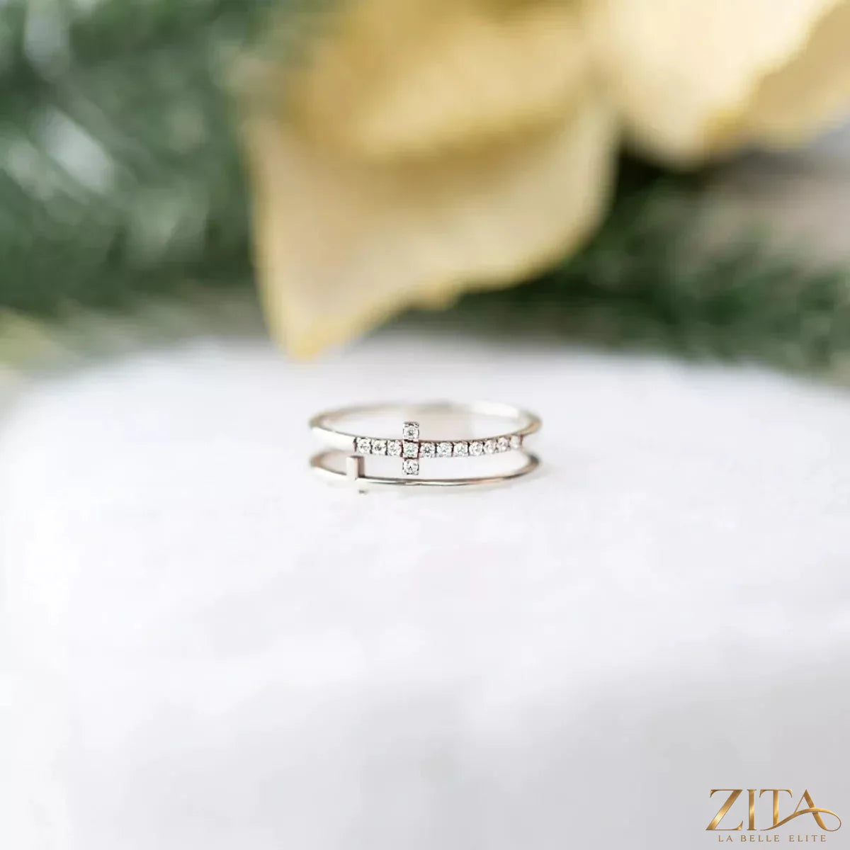 Silver double band cross ring by Zita La Belle Elite featuring a sleek, modern design with intersecting bands and a cross detail.