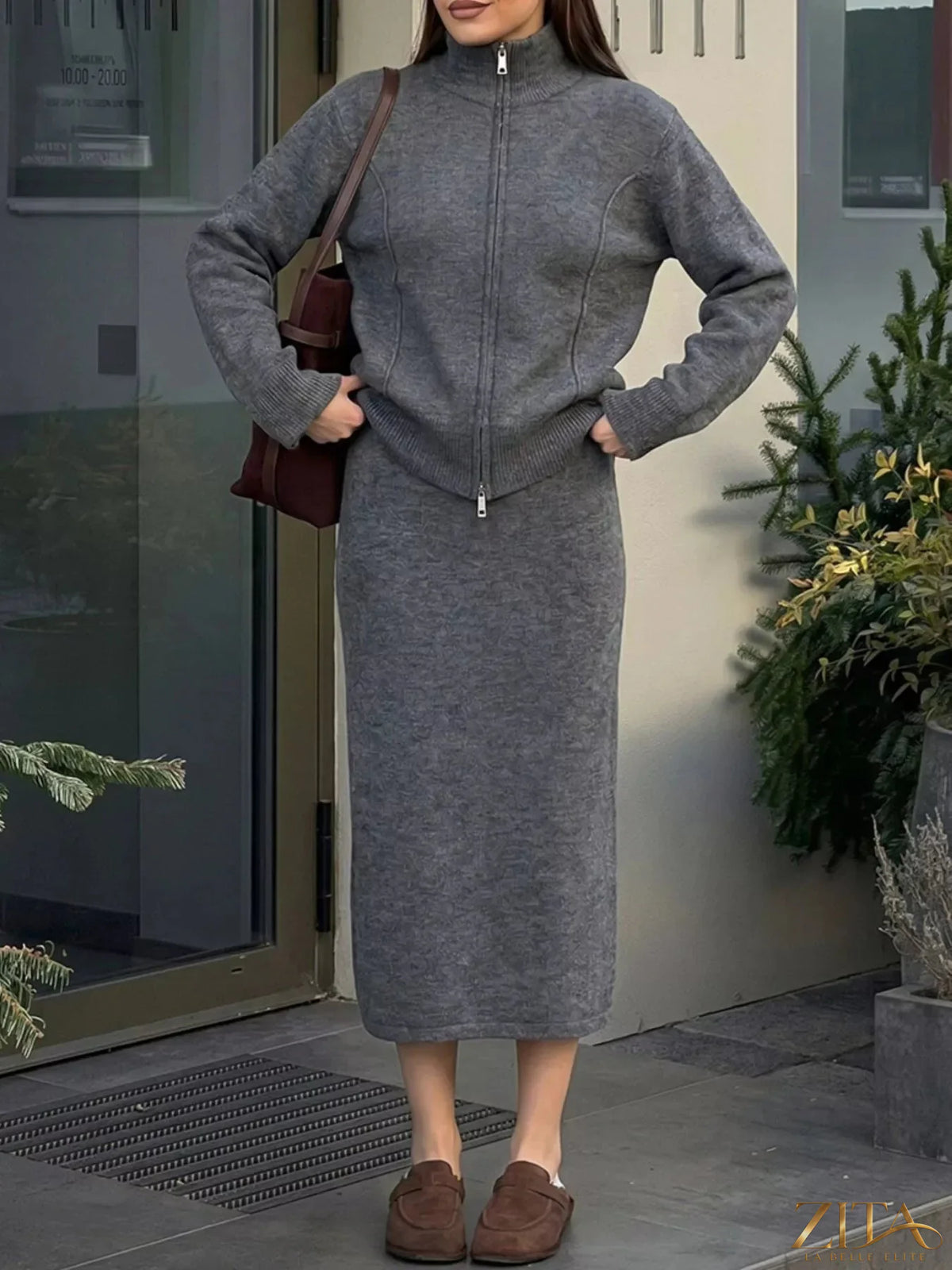 Zita La Belle Elite zip-up mock neck cardigan and matching midi skirt sweater set displayed on a model.