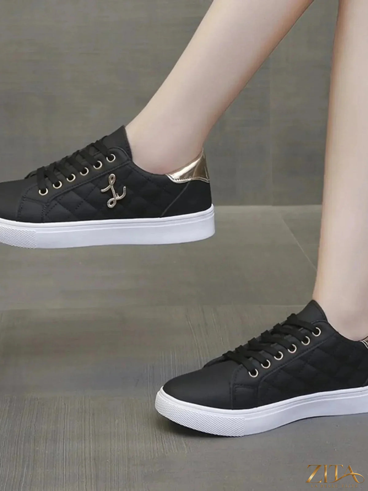Zita La Belle Elite quilted platform sneakers with metallic gold accents, showing the stylish design and textured quilted surface.