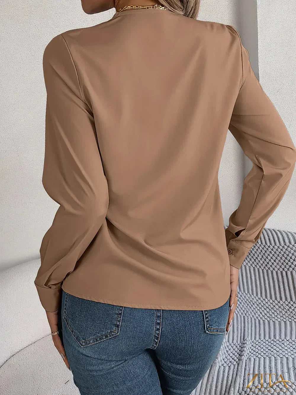 Zita La Belle Elite V-neck long sleeve blouse in soft fabric, shown in a stylish fit with a V-neckline and long sleeve design.