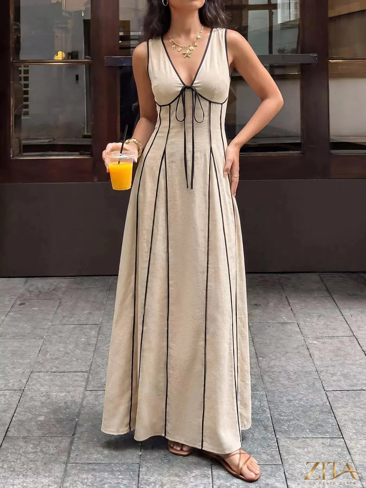 Zita La Belle Elite sleeveless V-neck maxi dress in flowing fabric, perfect for elegant summer occasions.