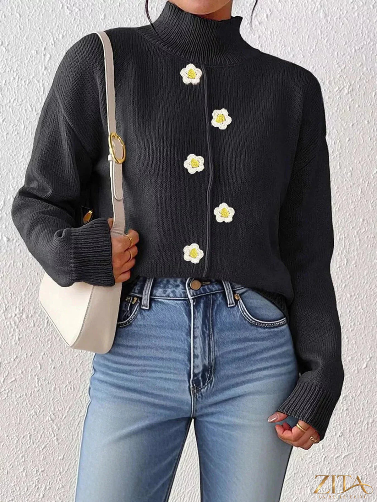 Zita La Belle Elite floral applique turtleneck sweater with colorful embroidered floral details on a cozy knit fabric.