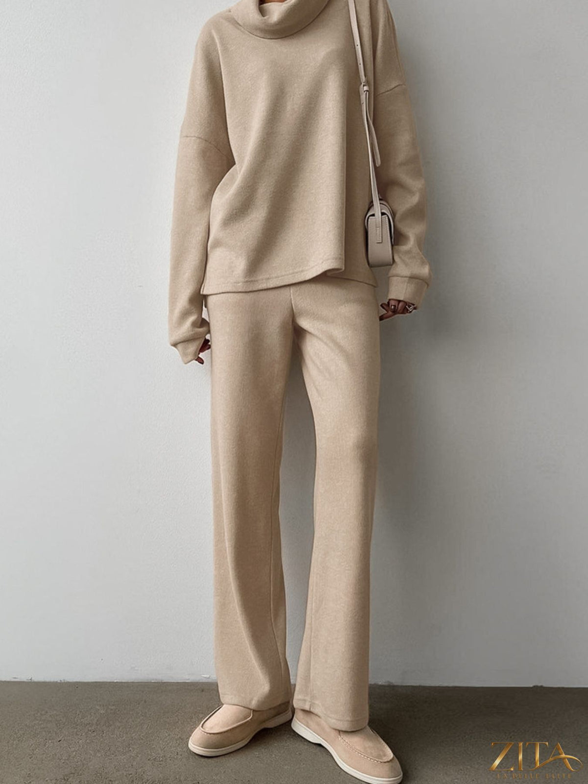 Trendsi turtleneck long sleeve top and pants set in soft fabric, featuring a fitted design and neutral color for stylish comfort.