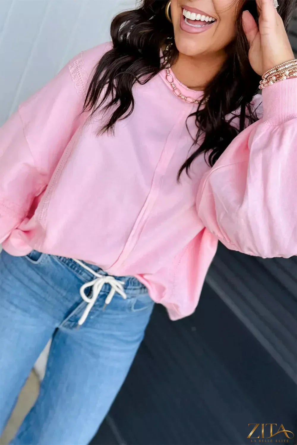 Zita La Belle Elite solid color raw seam lace detail loose casual sweatshirt with relaxed fit and minimal design.