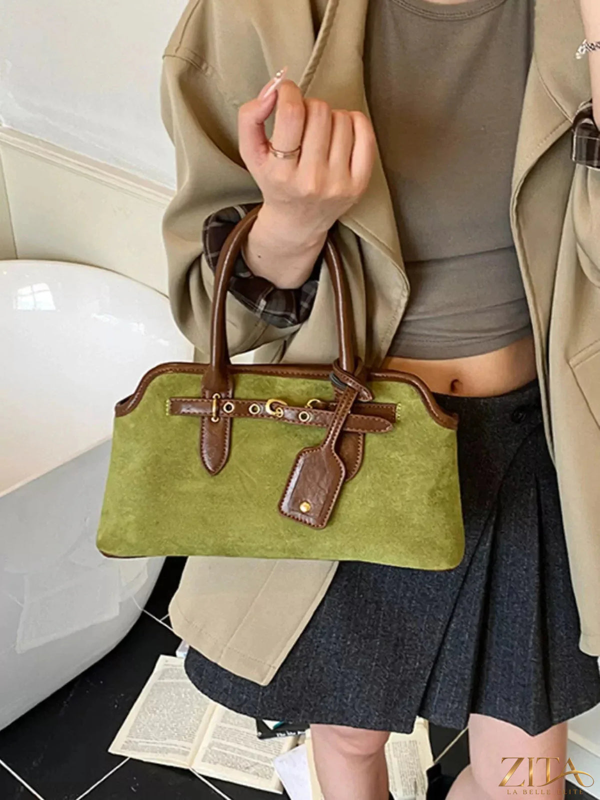 Vintage Zita La Belle Elite handbag with buckle detail, featuring a classic leather design and elegant craftsmanship.