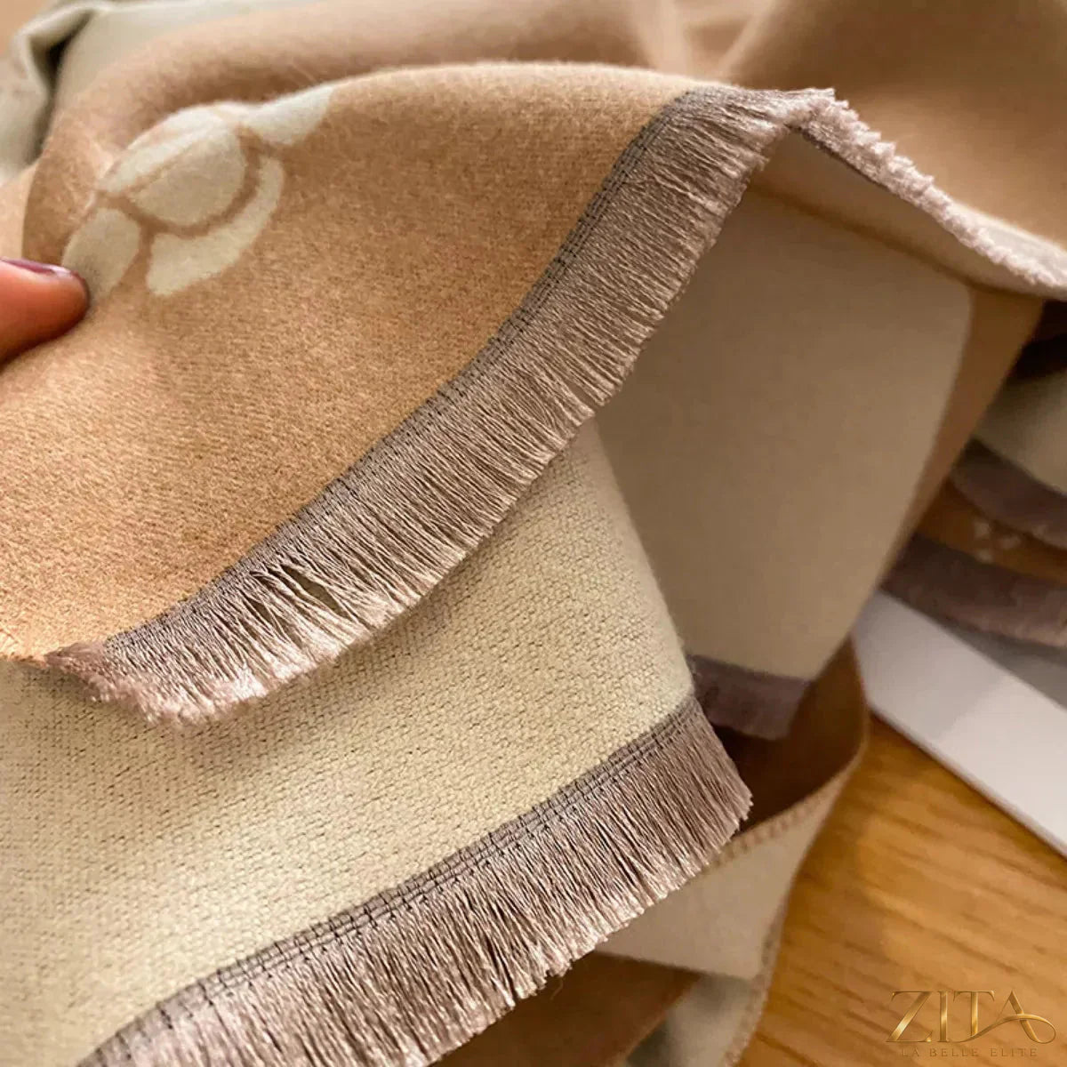 Raw hem scarf by Trendsi featuring soft fabric and frayed edges, displayed in a close-up view showcasing its textured detail.