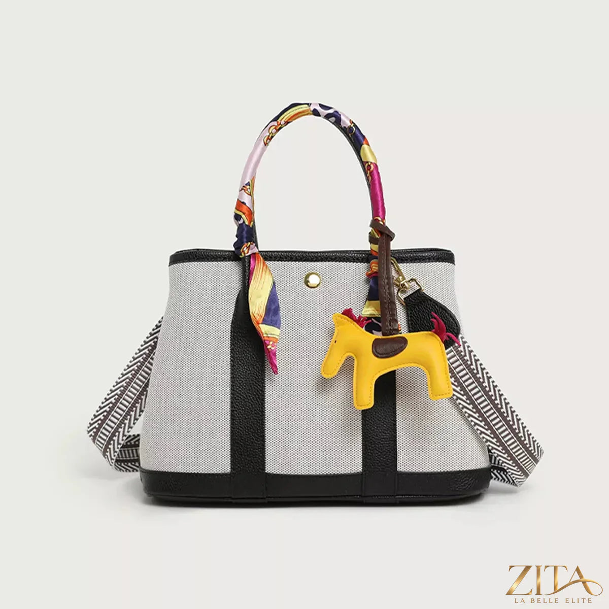 Zita La Belle Elite canvas handbag with silk scarf and horse charm, stylish accessory for casual or elegant outfits.
