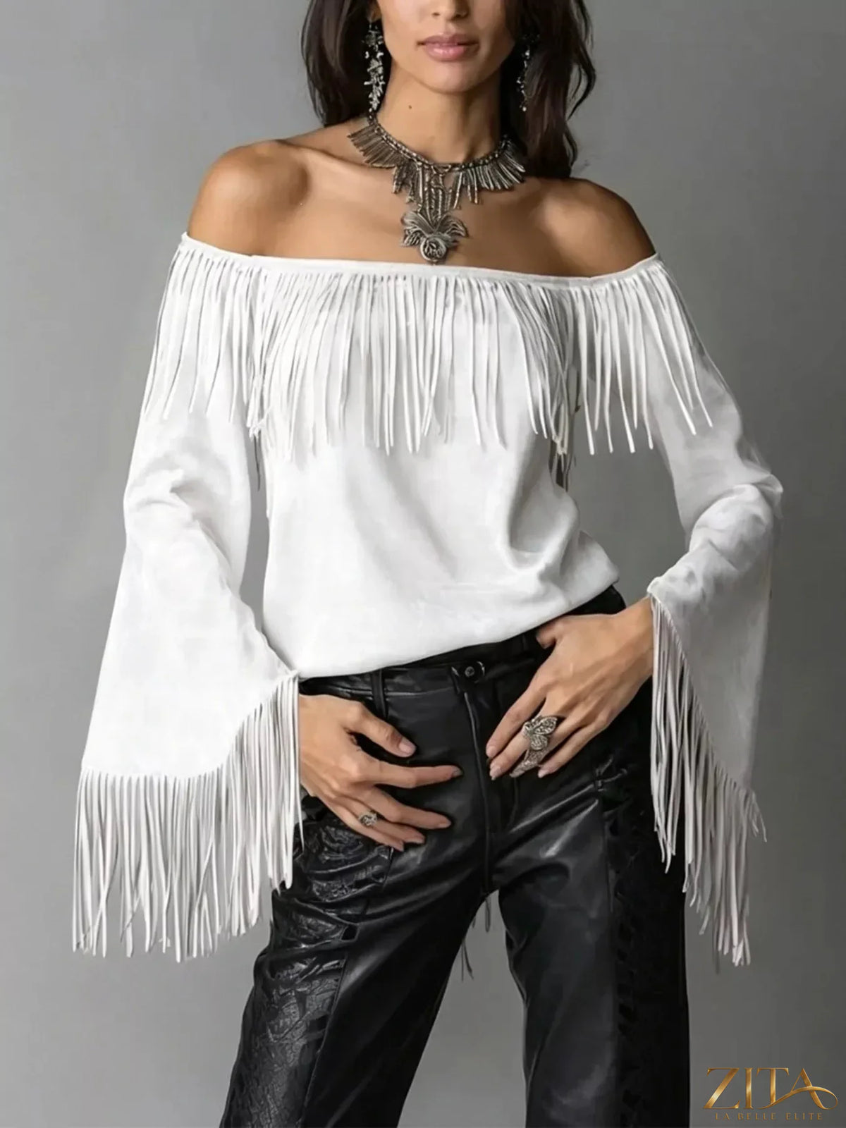 Zita La Belle Elite boho chic off-shoulder suede top with fringed details, styled with a relaxed fit and trendy design.