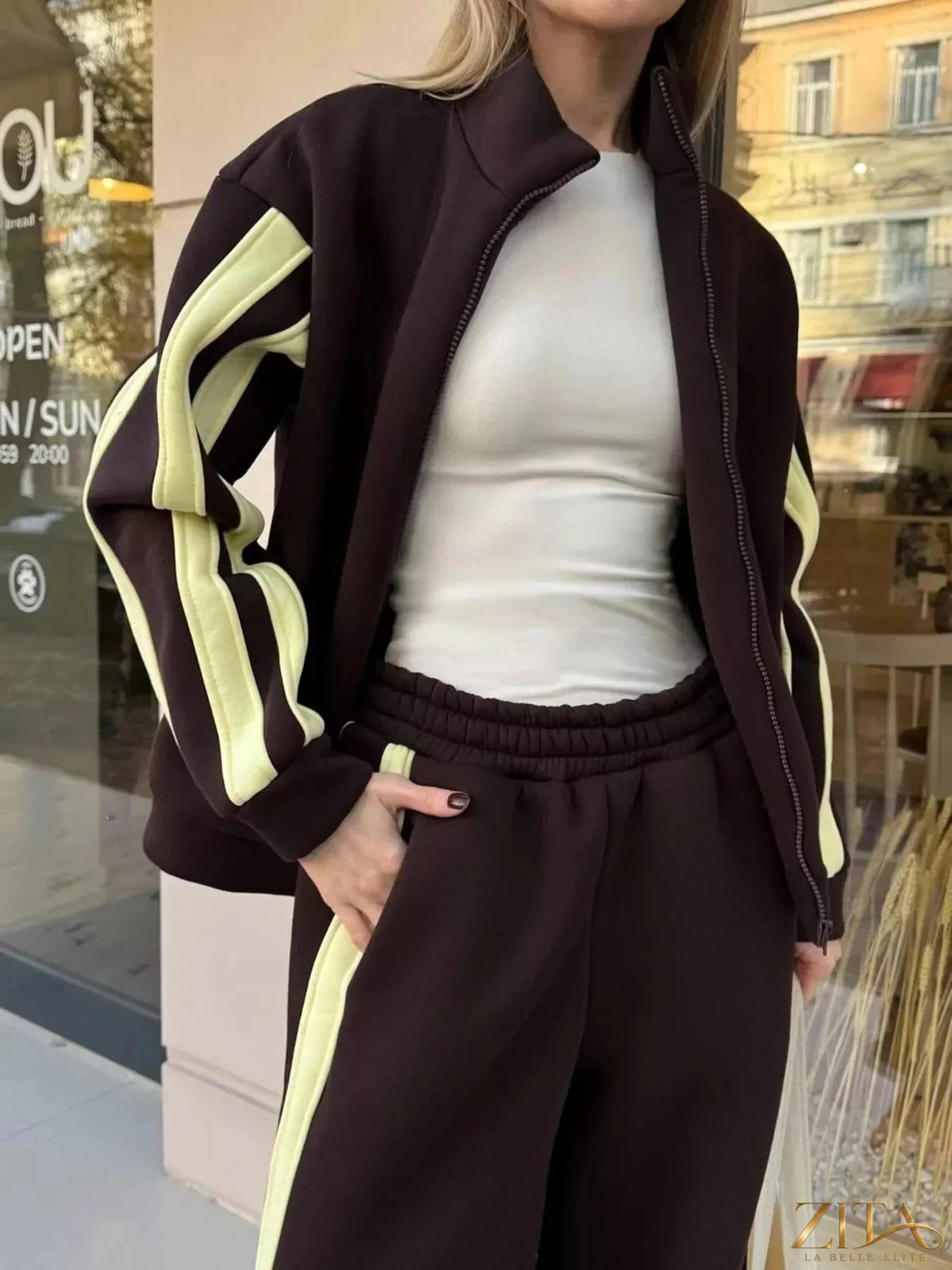 Zita La Belle Elite contrast striped zip-up top and matching pants set, stylish loungewear with bold black and white stripes.