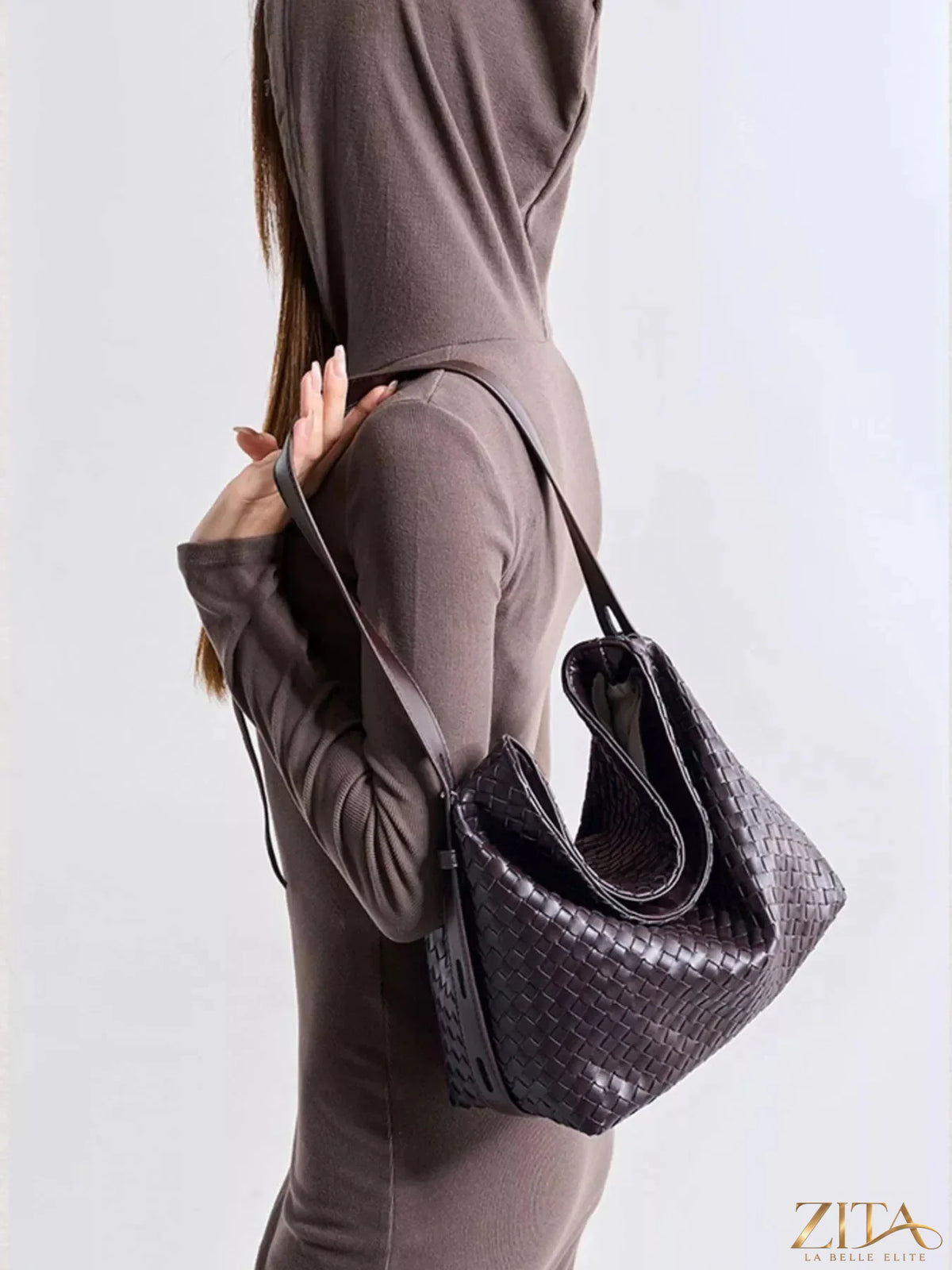 Woven leather hobo shoulder bag by Zita La Belle Elite with spacious interior and stylish design, shown in natural light.