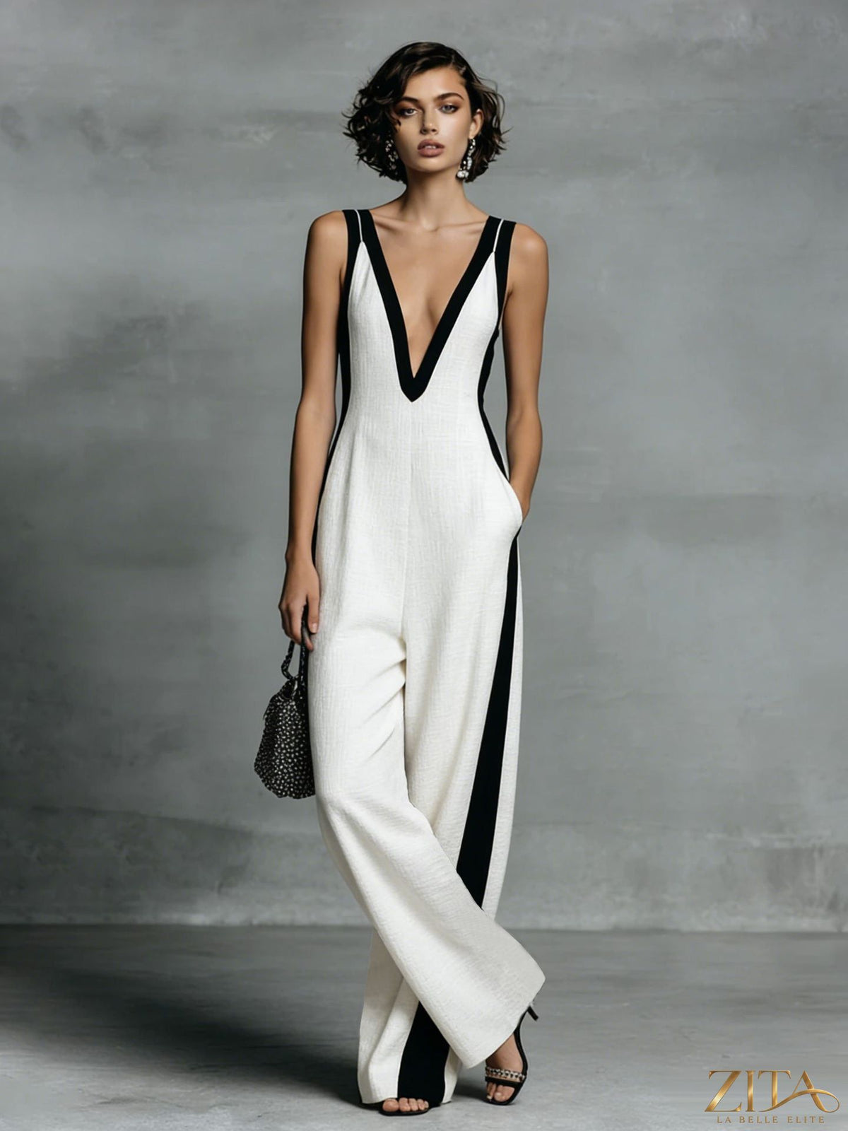 Color-block sleeveless V-neck wide-leg jumpsuit by Zita La Belle Elite, casualwear with bold color panels and comfortable fit.