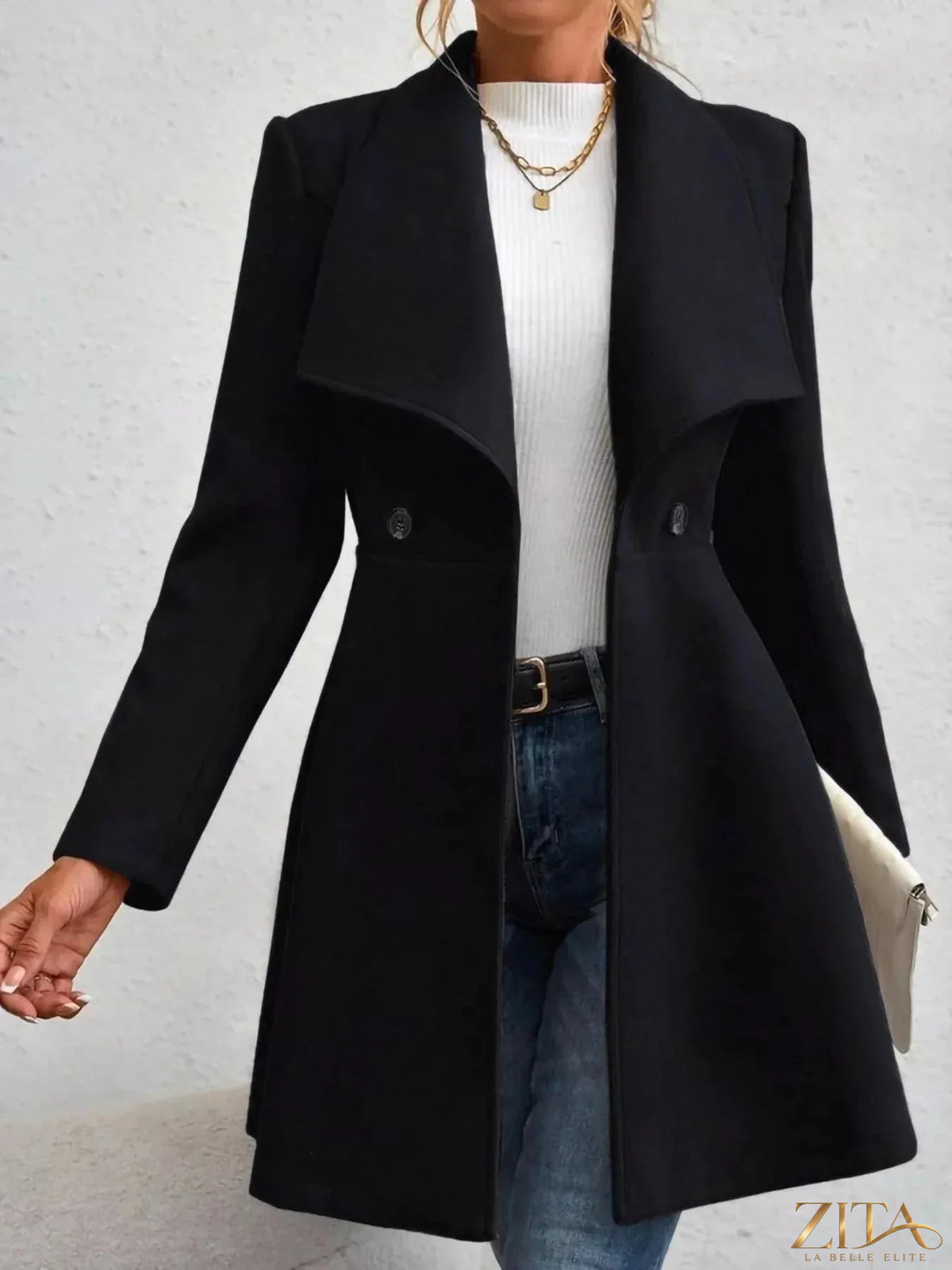 Zita La Belle Elite double-breasted wool blend coat with wide lapels and button details, displayed on a hanger.