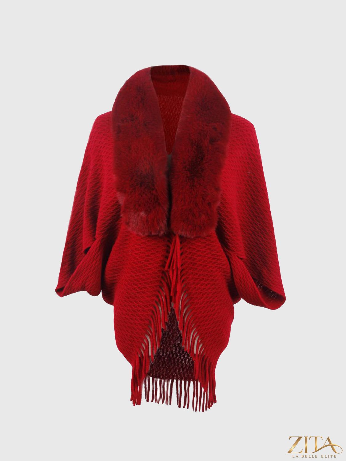 Open front fringe hem poncho by Trendsi featuring a flowy design and fringe details, shown laid flat on a white background.