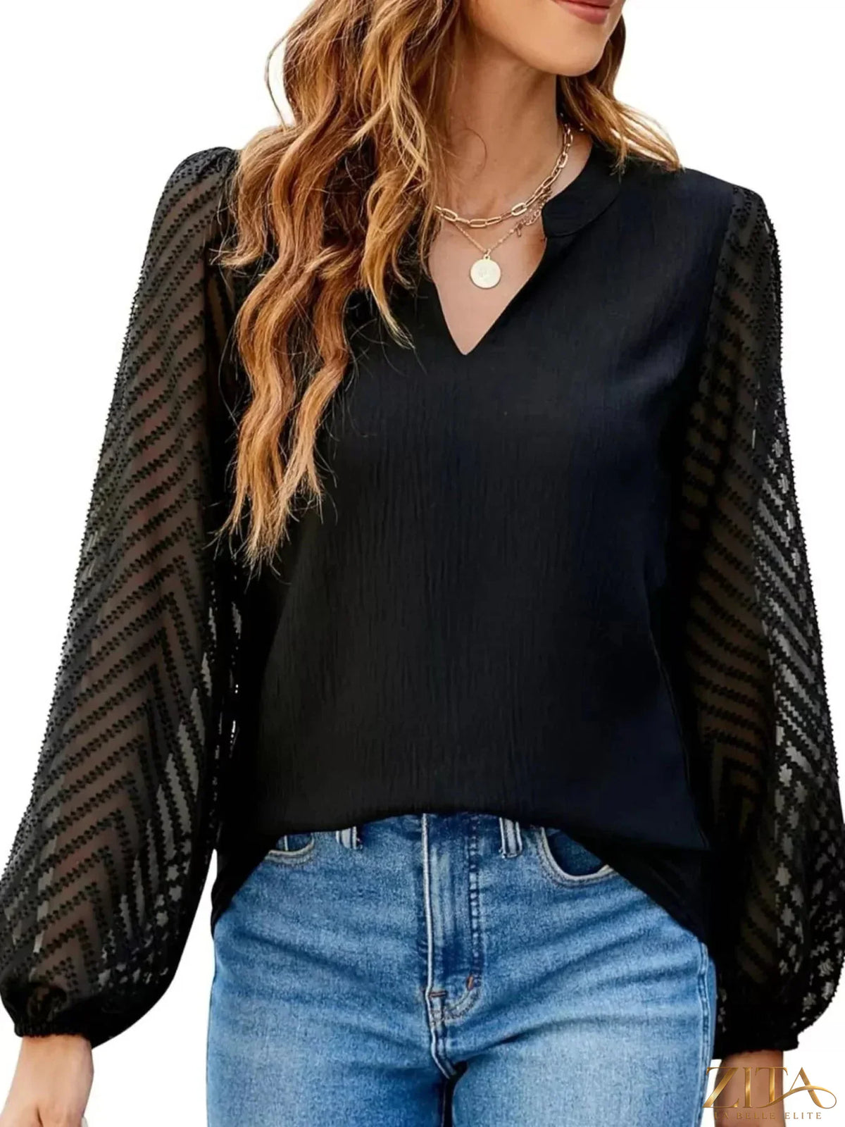 Zita La Belle Elite notched balloon sleeve blouse in soft fabric with stylish sleeve details and a relaxed fit.