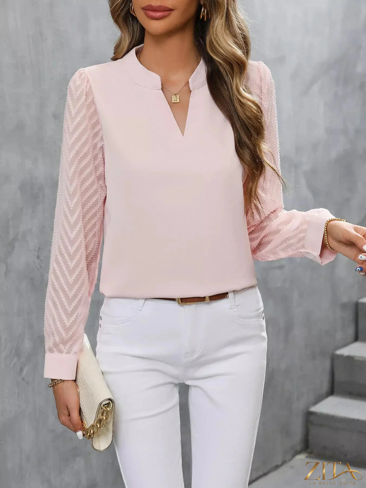 Zita La Belle Elite sheer sleeve v-neck blouse with lightweight fabric and elegant fit, shown on a model.