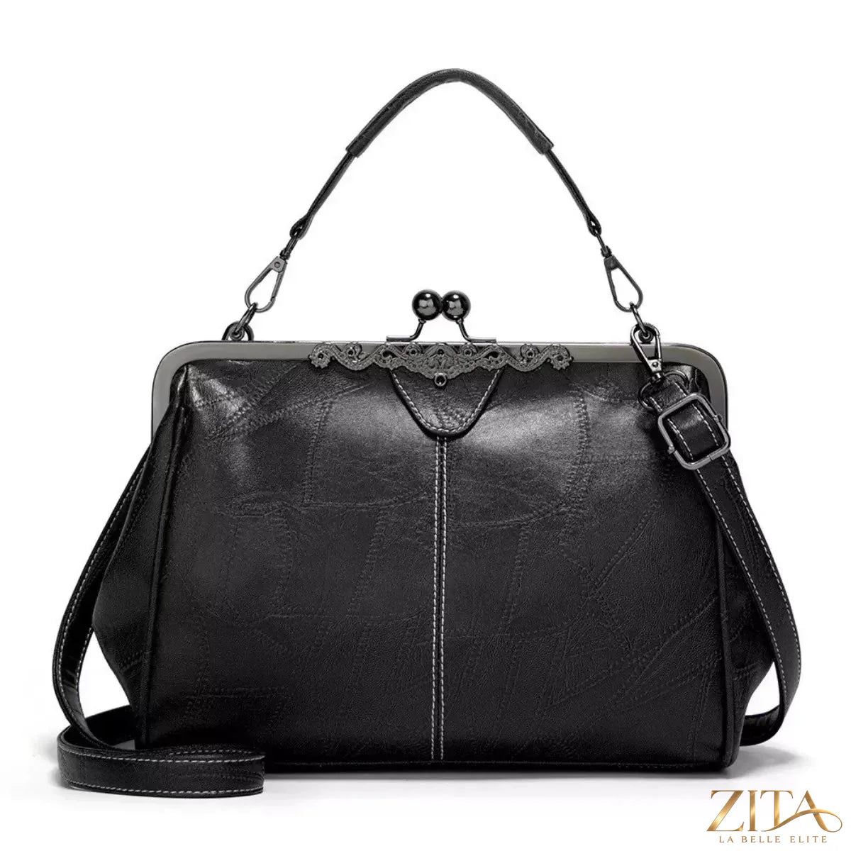 Vintage Zita La Belle Elite leather handbag with kiss lock closure, showcasing a classic design and textured leather surface.