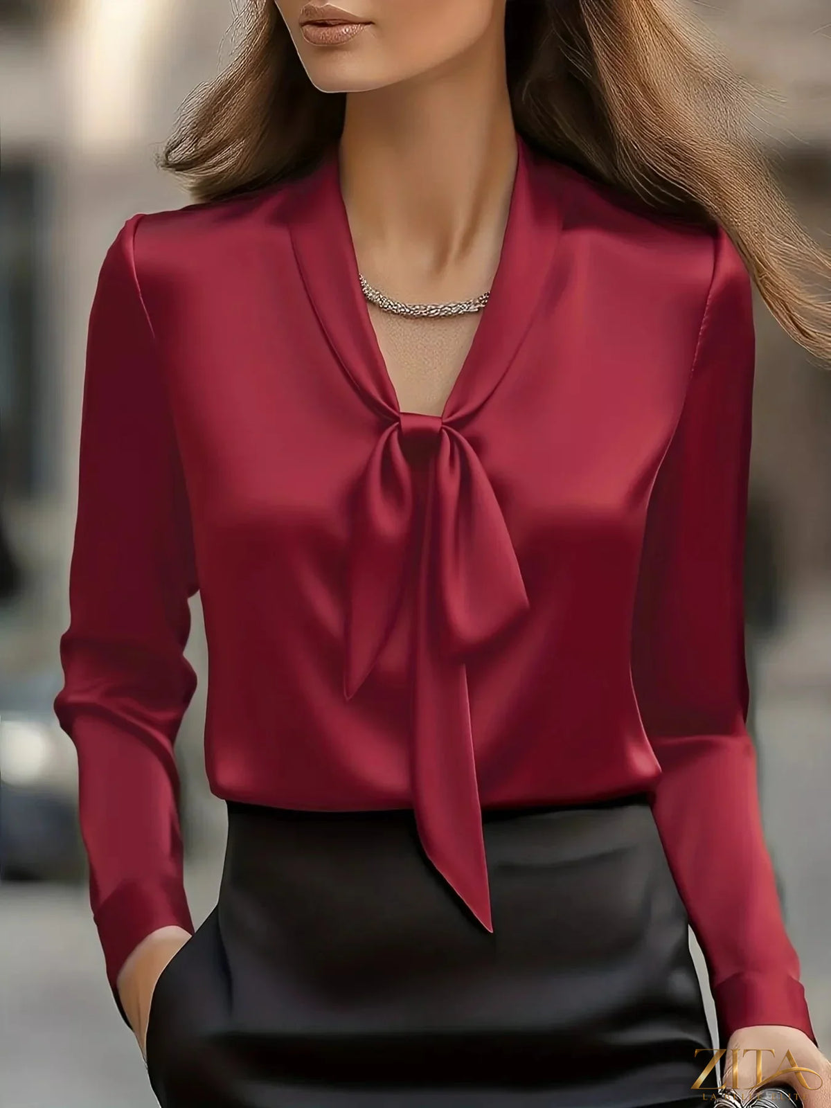 Zita La Belle Elite satin tie-front long sleeve blouse with a stylish V-neck and elegant feminine design.