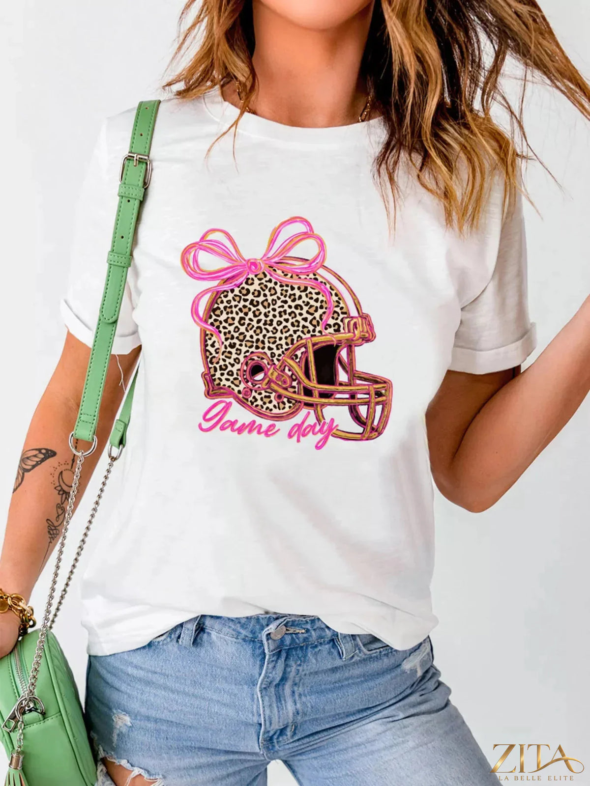 Leopard print game day graphic tee by Trendsi featuring a bold animal print design on a casual T-shirt.