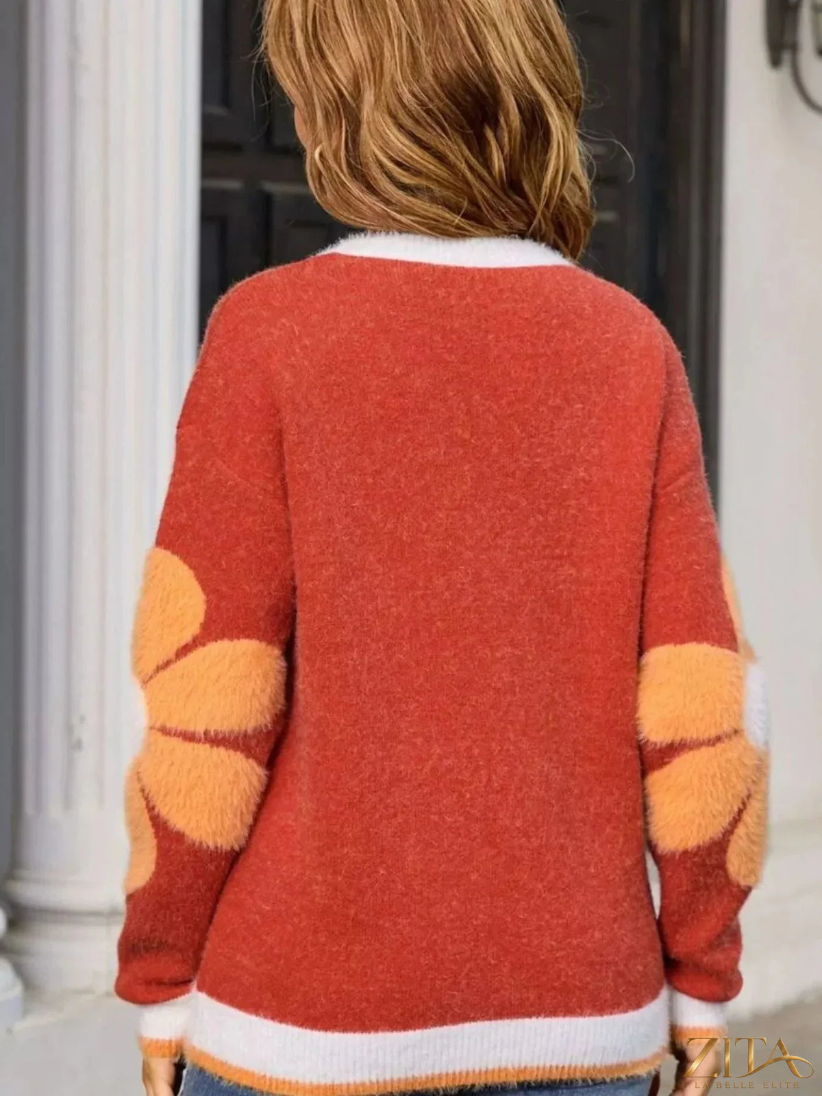 Zita La Belle Elite flower round neck sweater featuring a floral pattern and soft knit fabric in a close-up view