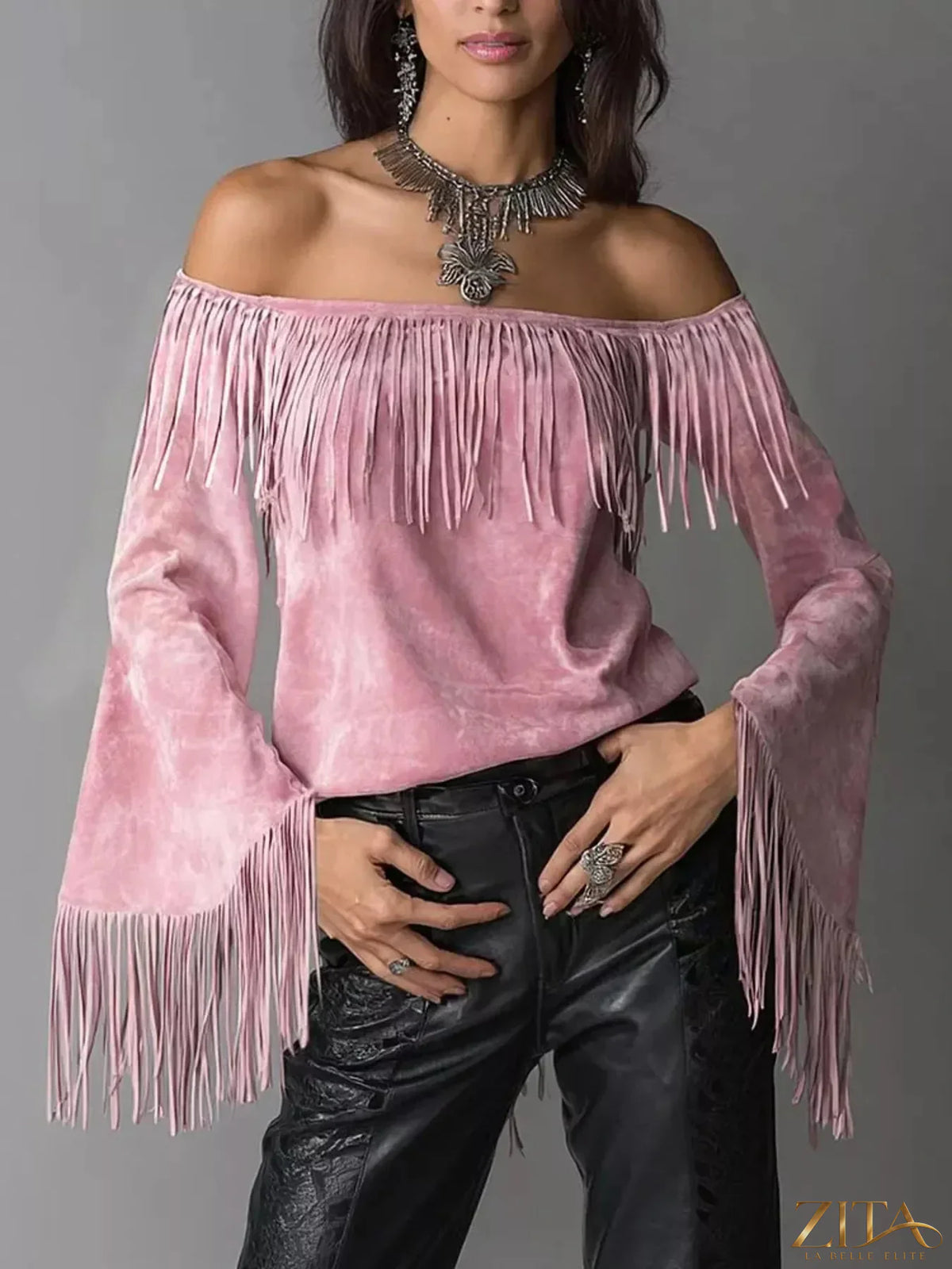 Plus size fringed off-shoulder T-shirt by Trendsi featuring a full size fit and stylish fringe detail on the shoulders.