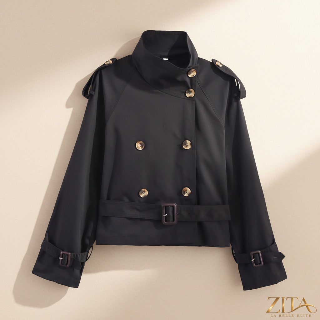 Women's short trench coat with notch collar and belt buckle detail by Zita La Belle Elite, showing the stylish jacket front view.
