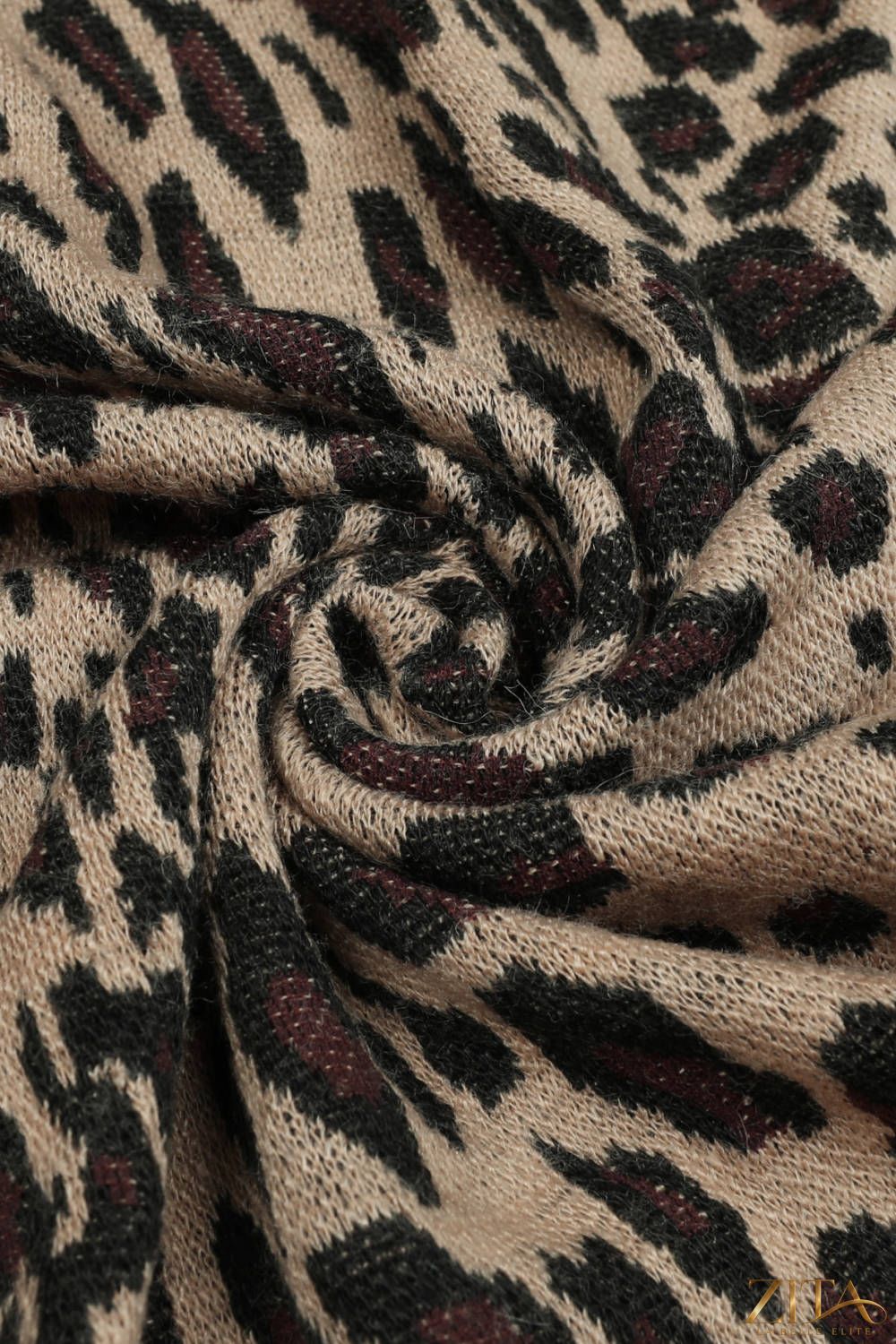 Leopard open front poncho by Trendsi, showcasing stylish animal print and cozy, flowy fabric on a neutral background.