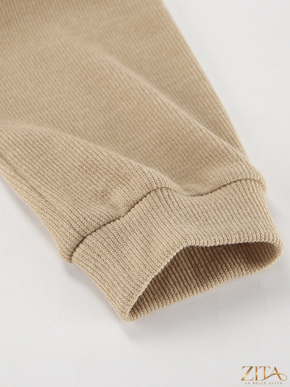 Trendsi turtleneck long sleeve top and matching pants set in a cozy, stylish design, shown in a natural pose.