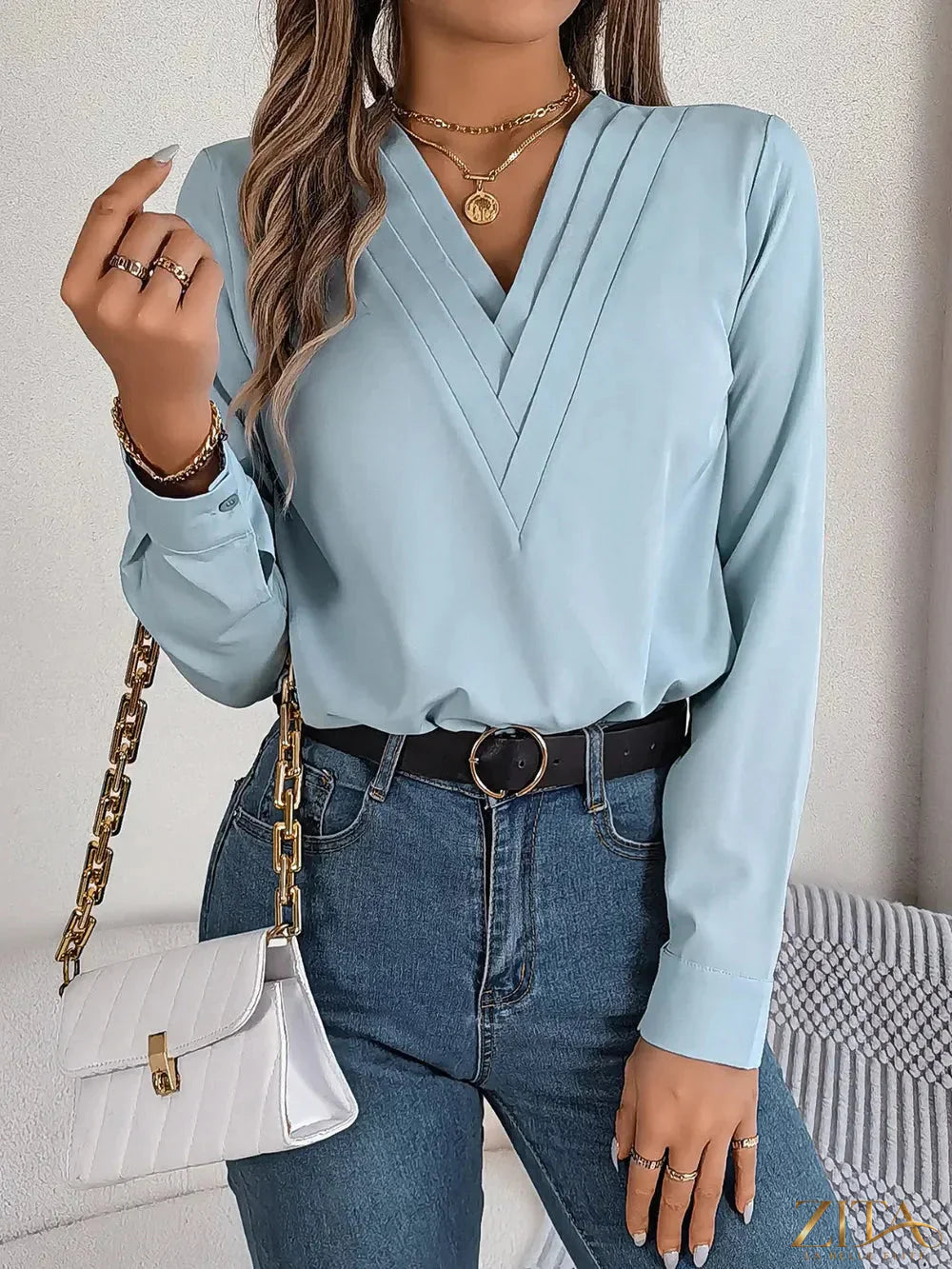 Zita La Belle Elite V-neck long sleeve blouse in soft fabric, featuring a stylish V-neck and elegant fit.