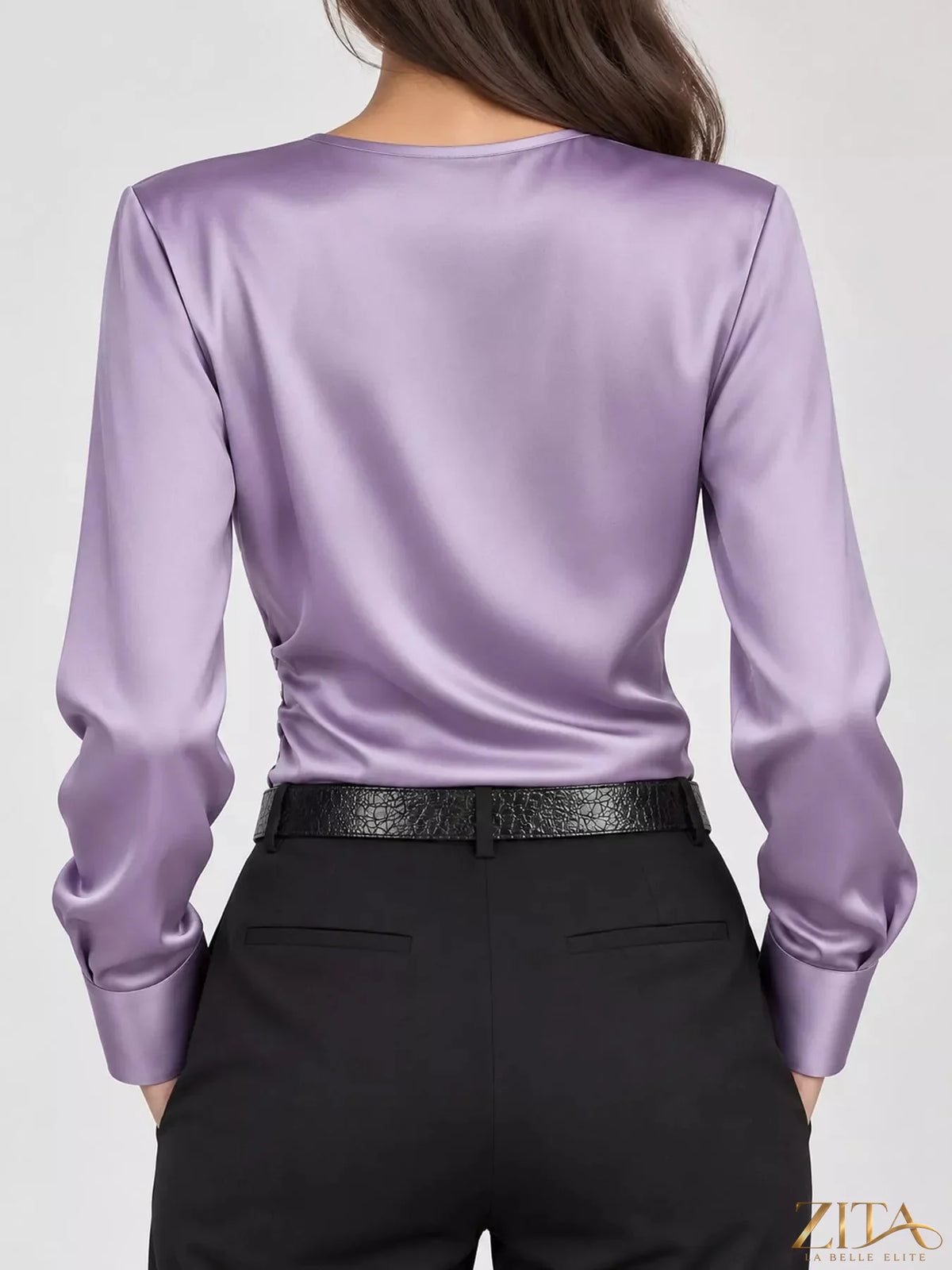 Zita La Belle Elite satin surplice long sleeve blouse with deep V neckline and elegant draping, in a soft, shiny fabric.