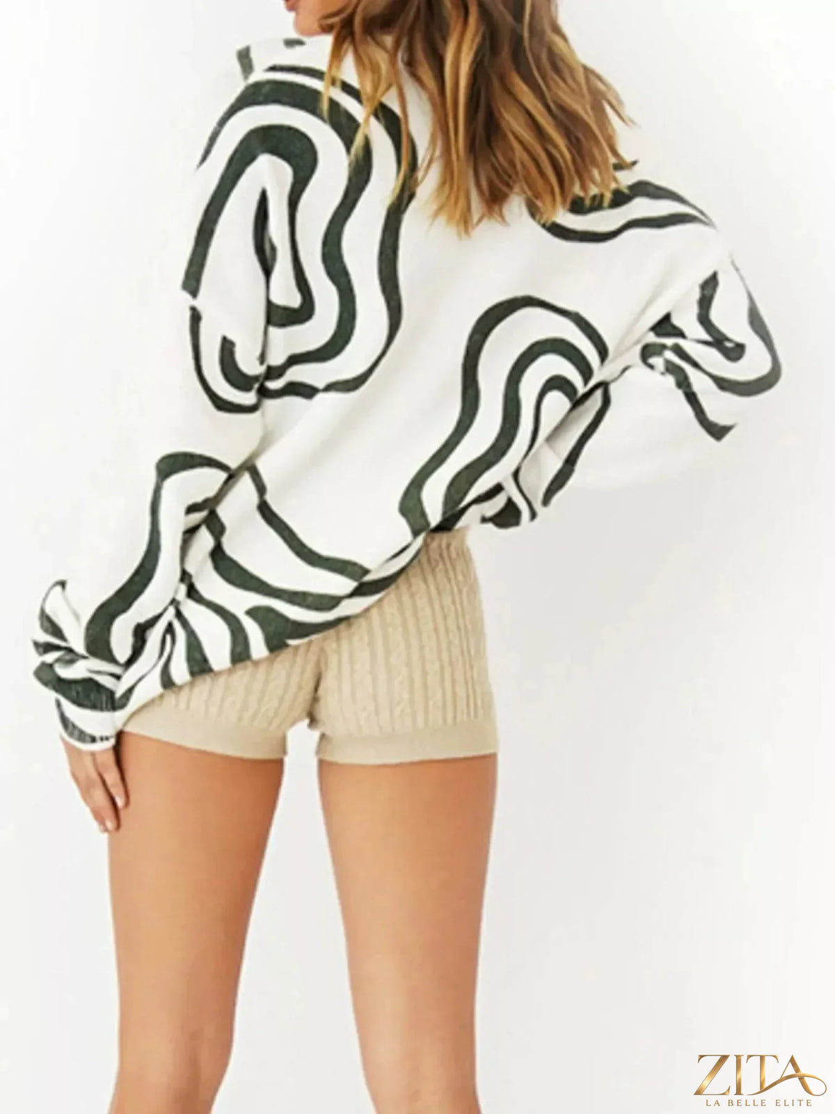 Wave pattern oversized sweater by Trendsi, featuring a cozy knit with a bold wave design in neutral tones, perfect for casual wear.