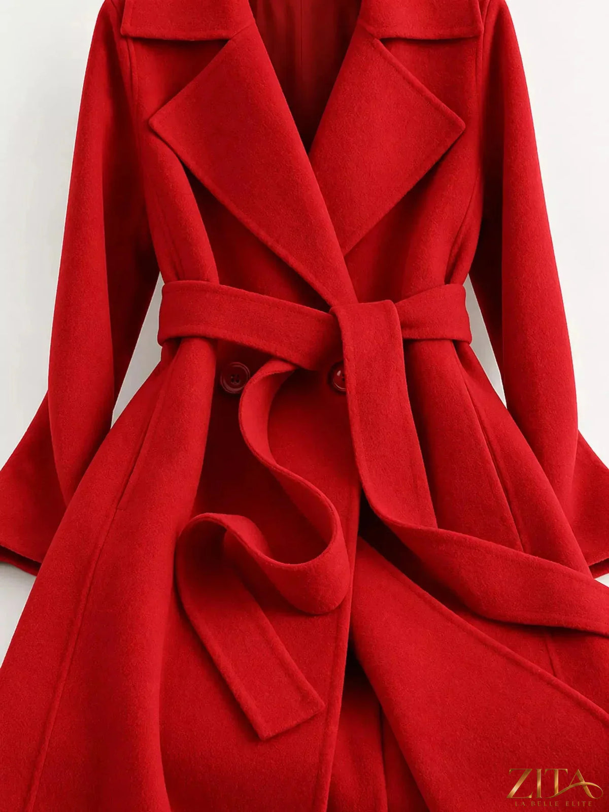 Longline wool coat by Zita La Belle Elite with waist-defining belt, stylish and warm outerwear for cold weather.