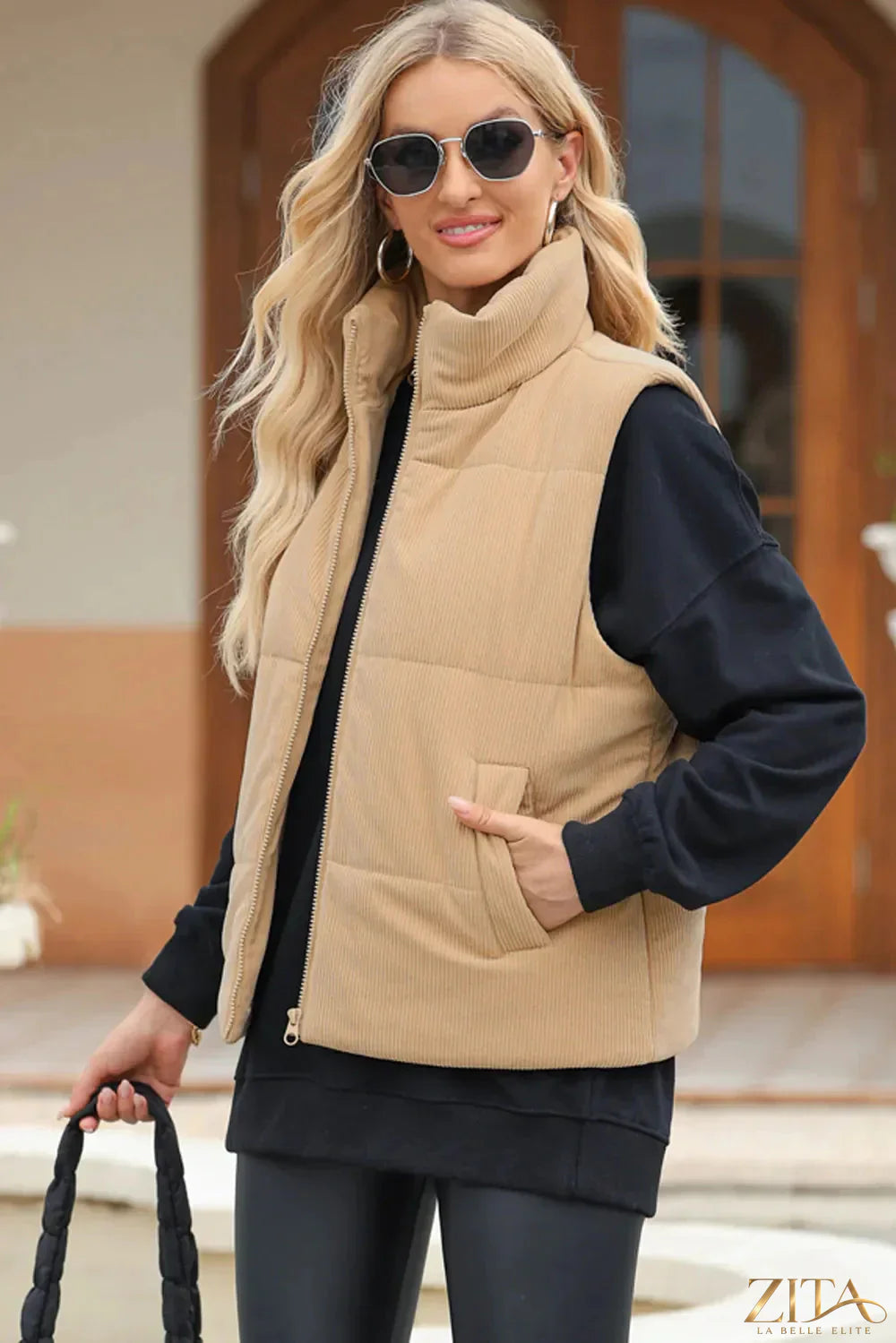 Trendsi pocketed zip-up turtleneck vest coat featuring a fitted design and front pockets, perfect for layered winter style.