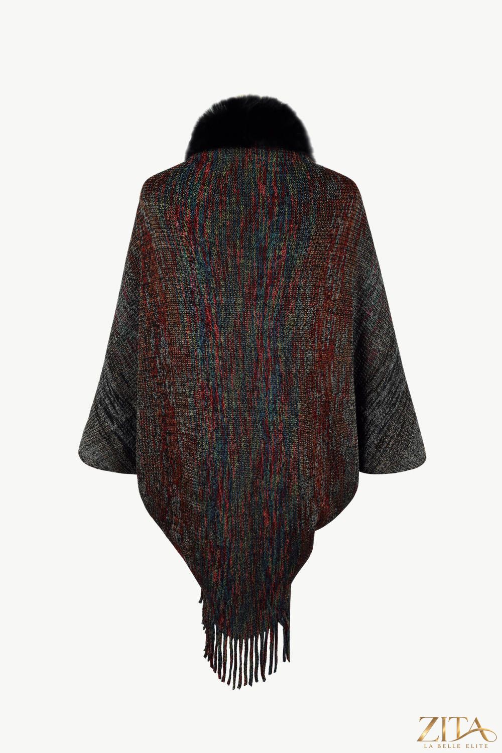 Open front fringe hem poncho by Trendsi, featuring a flowing design with fringe detail at the hem, perfect for layered style.