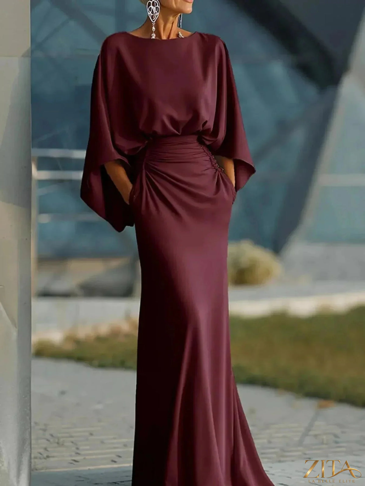 Zita La Belle Elite batwing sleeve ruched maxi dress in black, featuring flowing fabric and elegant design.