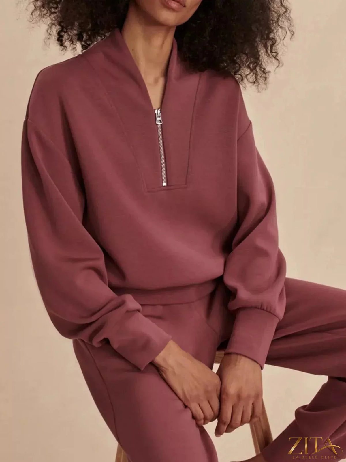 Zita La Belle Elite quarter-zip sweatshirt and wide-leg pants set, shown in a coordinated casual outfit.