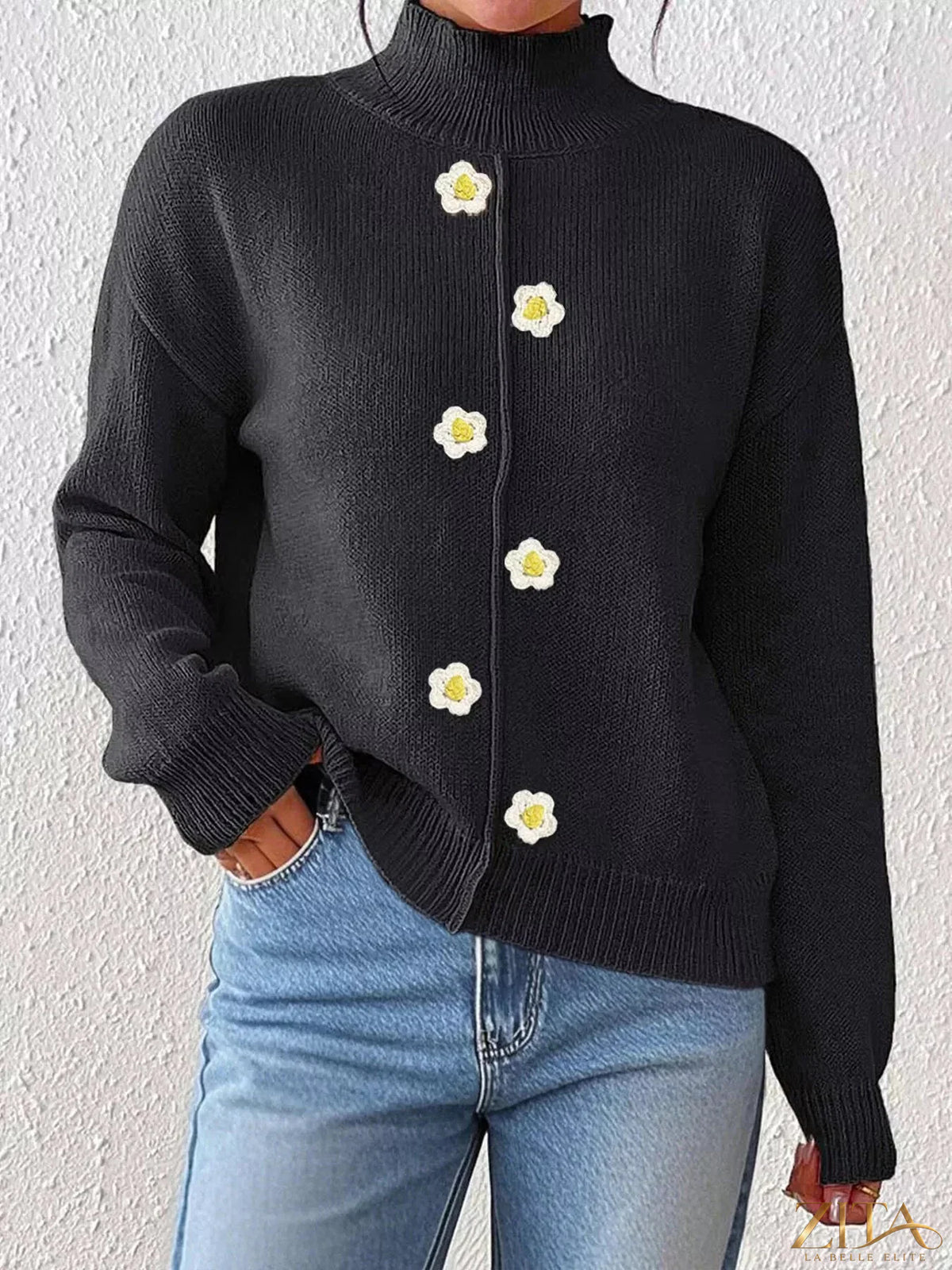 Zita La Belle Elite floral applique turtleneck sweater featuring colorful embroidered flower designs on a cozy knit fabric.