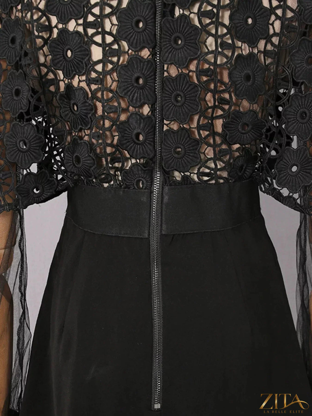 Lace sheer sleeve mini dress by Trendsi featuring delicate lace details and a fitted silhouette.