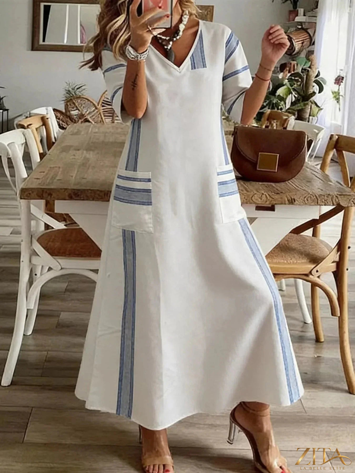 Zita La Belle Elite striped V-neck maxi dress with flowing fabric and bold horizontal stripes, full-length view.