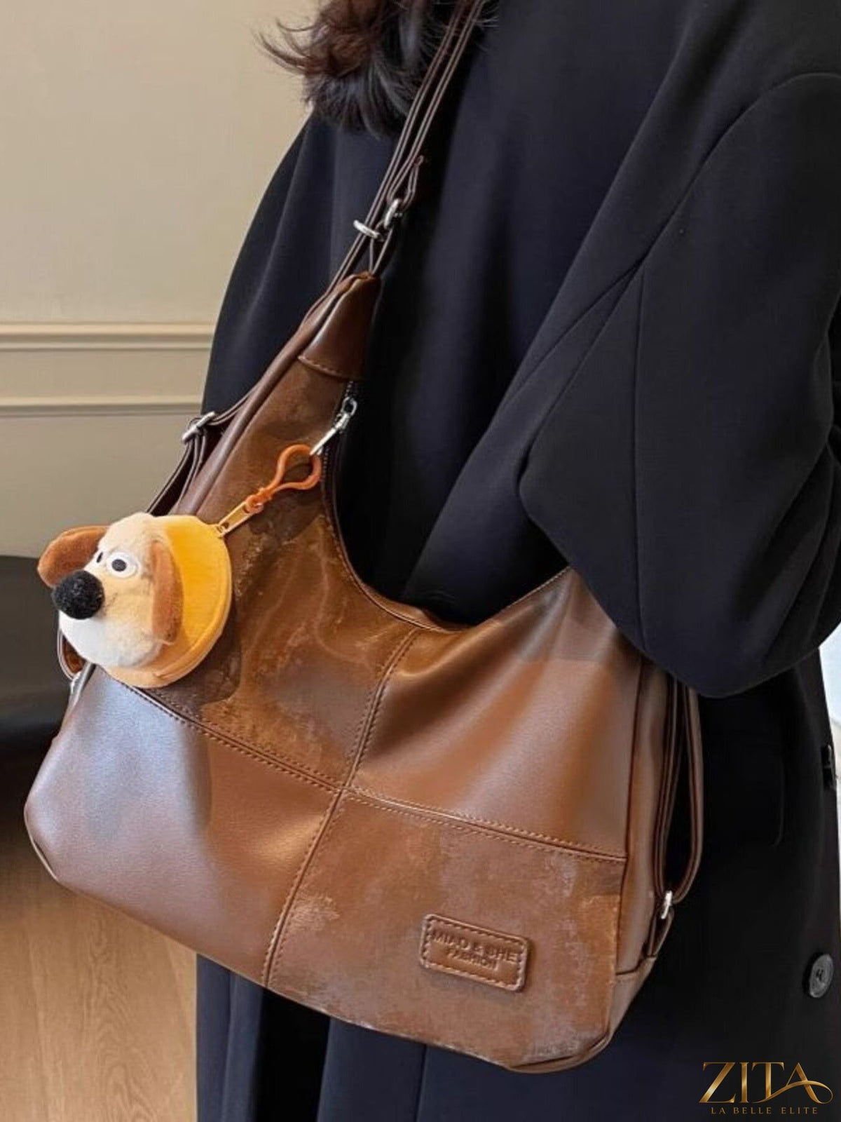 Vintage style hobo shoulder bag by Zita La Belle Elite, featuring soft leather and spacious design with a shoulder strap.