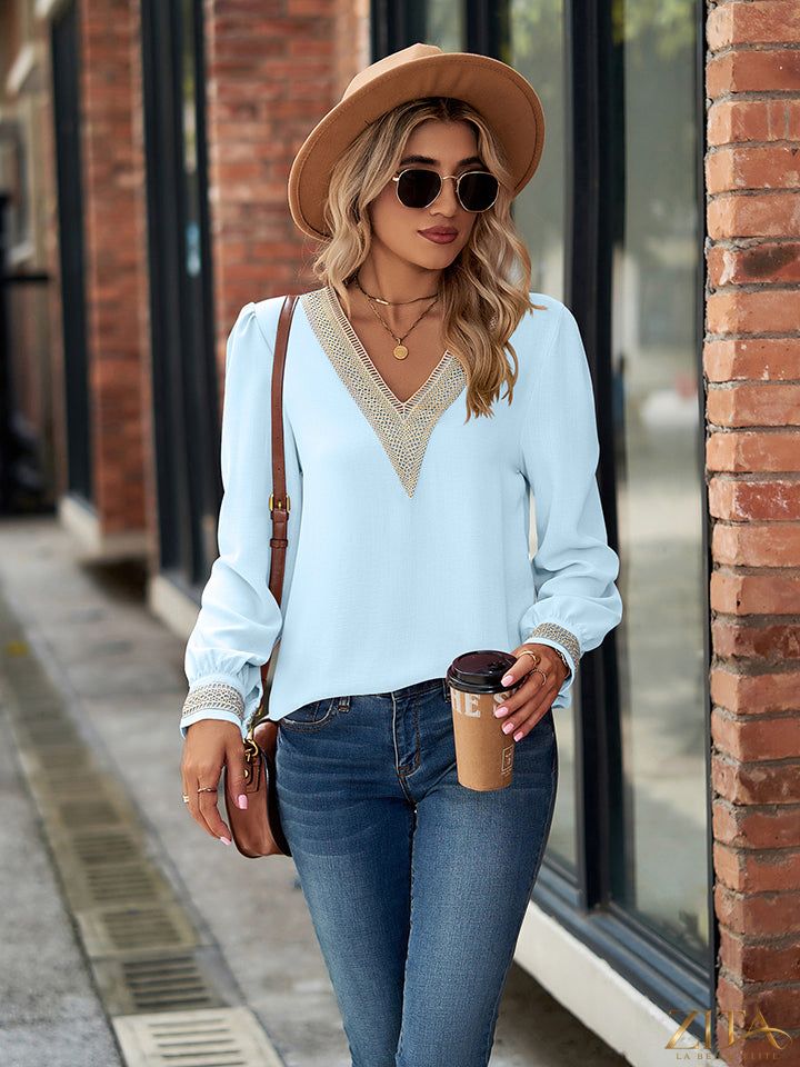 Zita La Belle Elite V-neck long sleeve blouse in soft fabric, shown on a mannequin with a relaxed fit and elegant style.